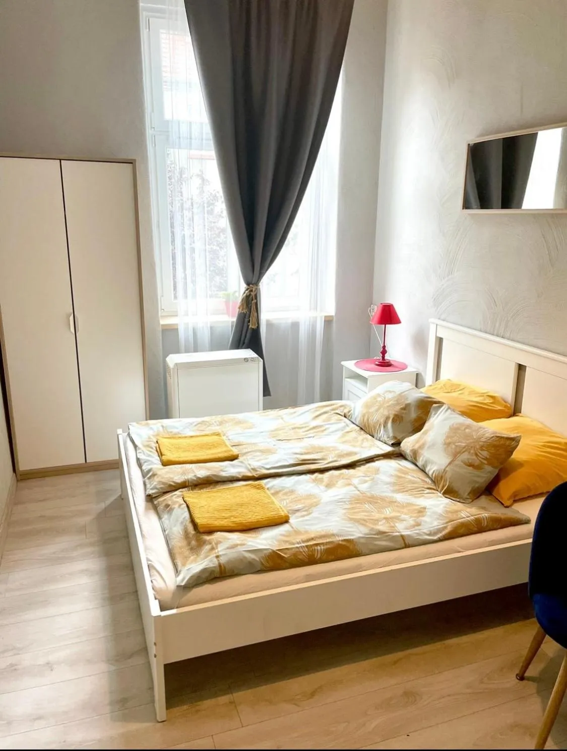 Bed in Colourful Rooms Wrocław