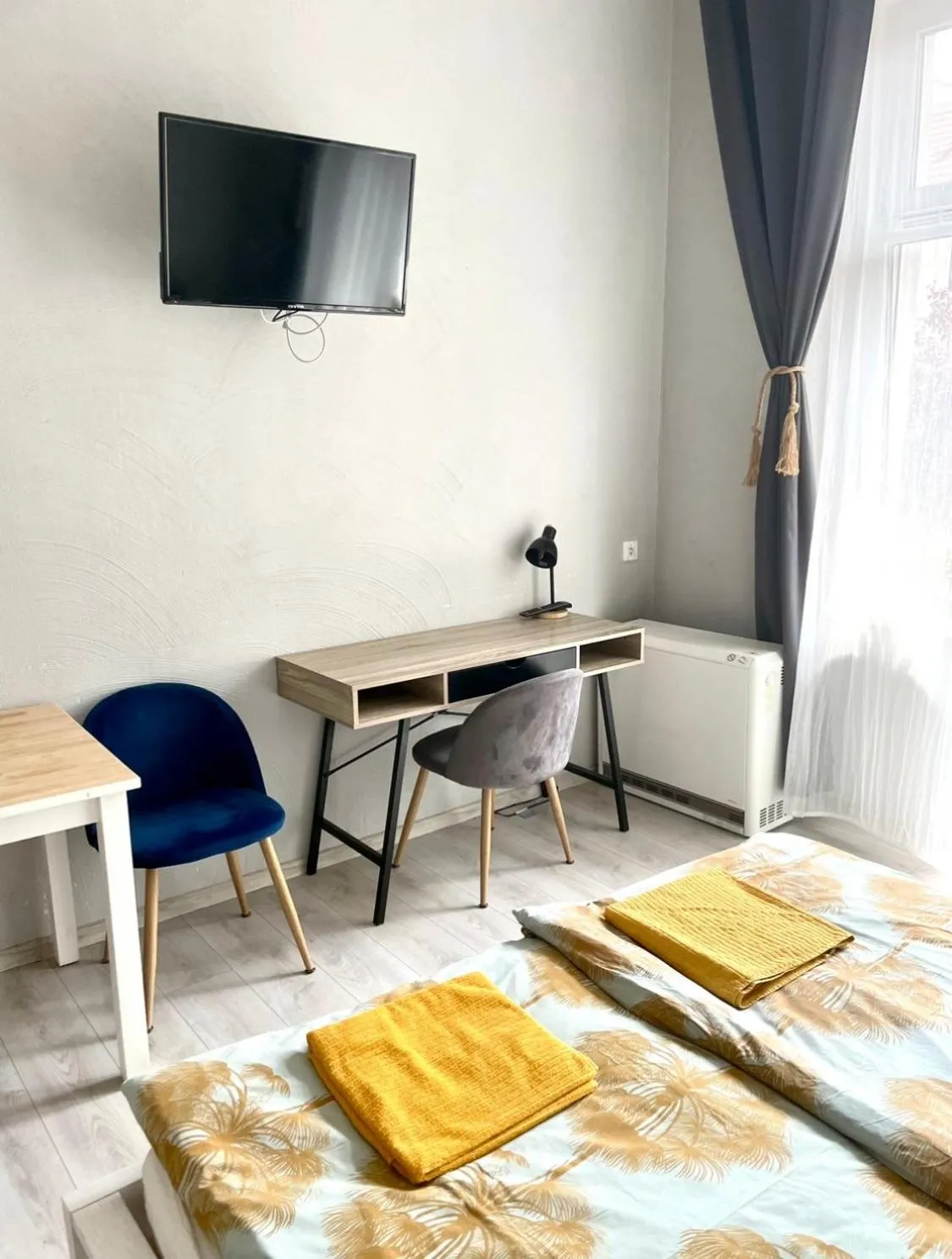 Bed in Colourful Rooms Wrocław