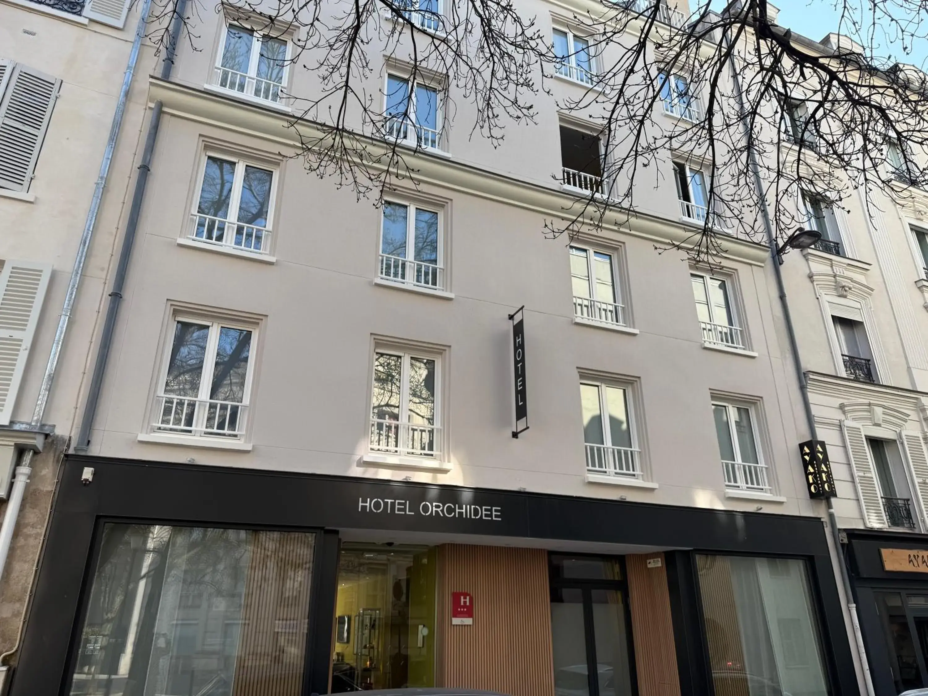 Property building in Hôtel Orchidée Property building in Hôtel Orchidée