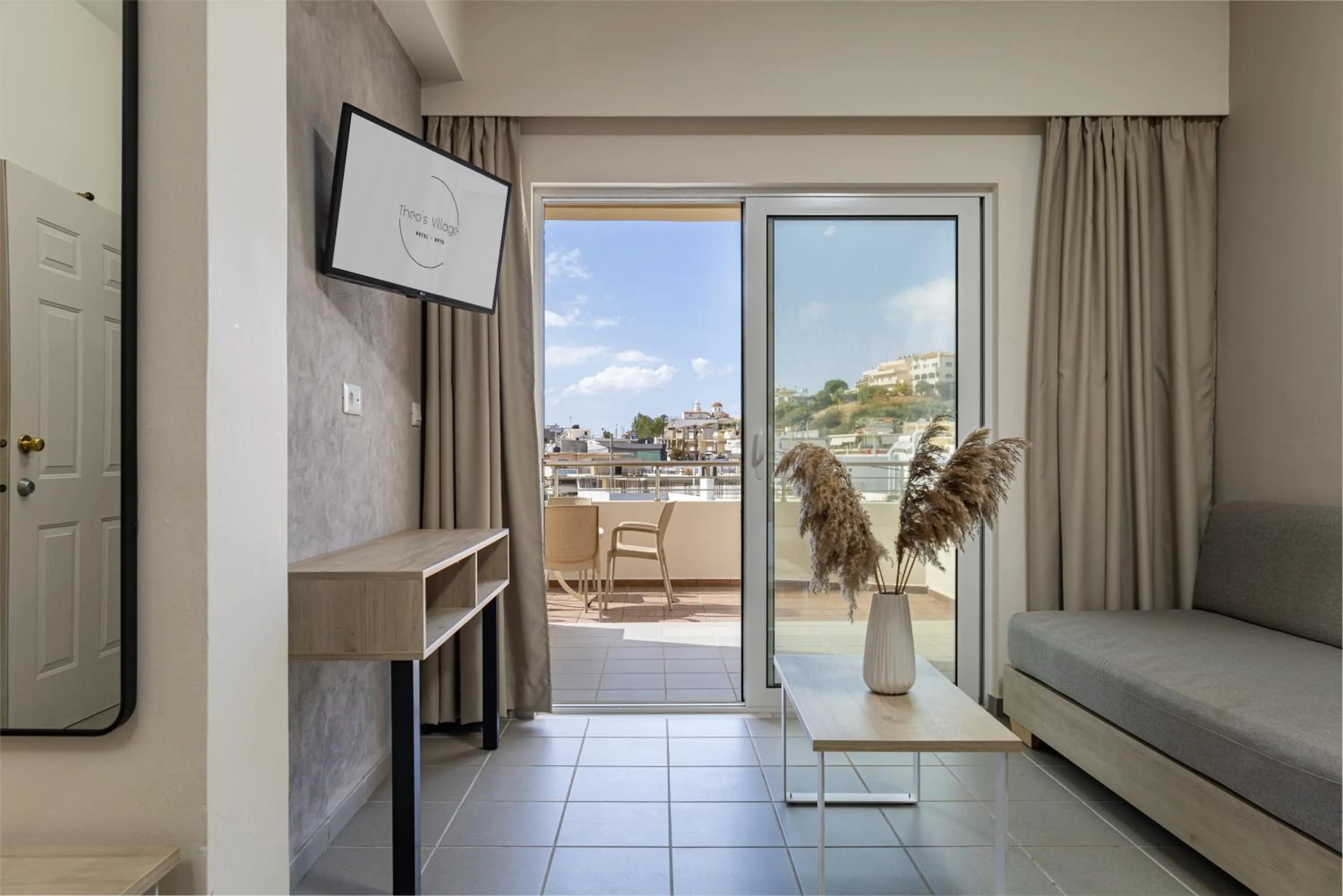 Theos Village Apartments