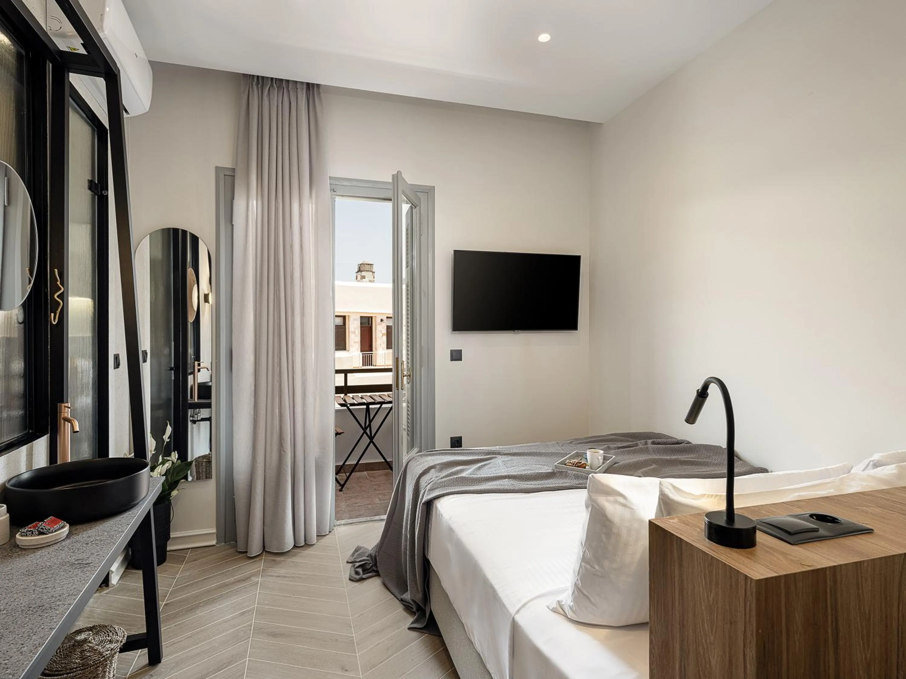 Bed in Amphitrite Hotel