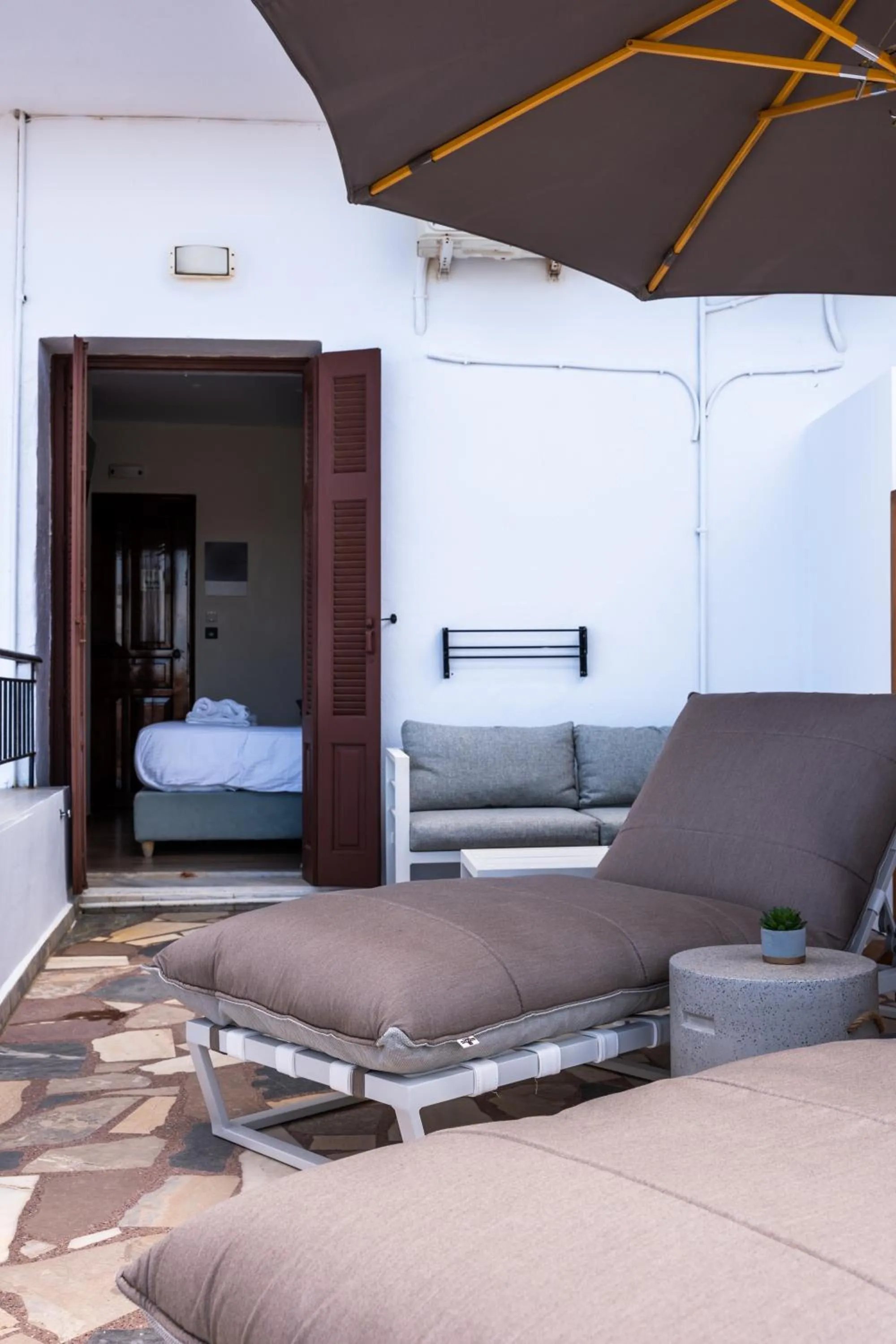 Bed in Amphitrite Hotel