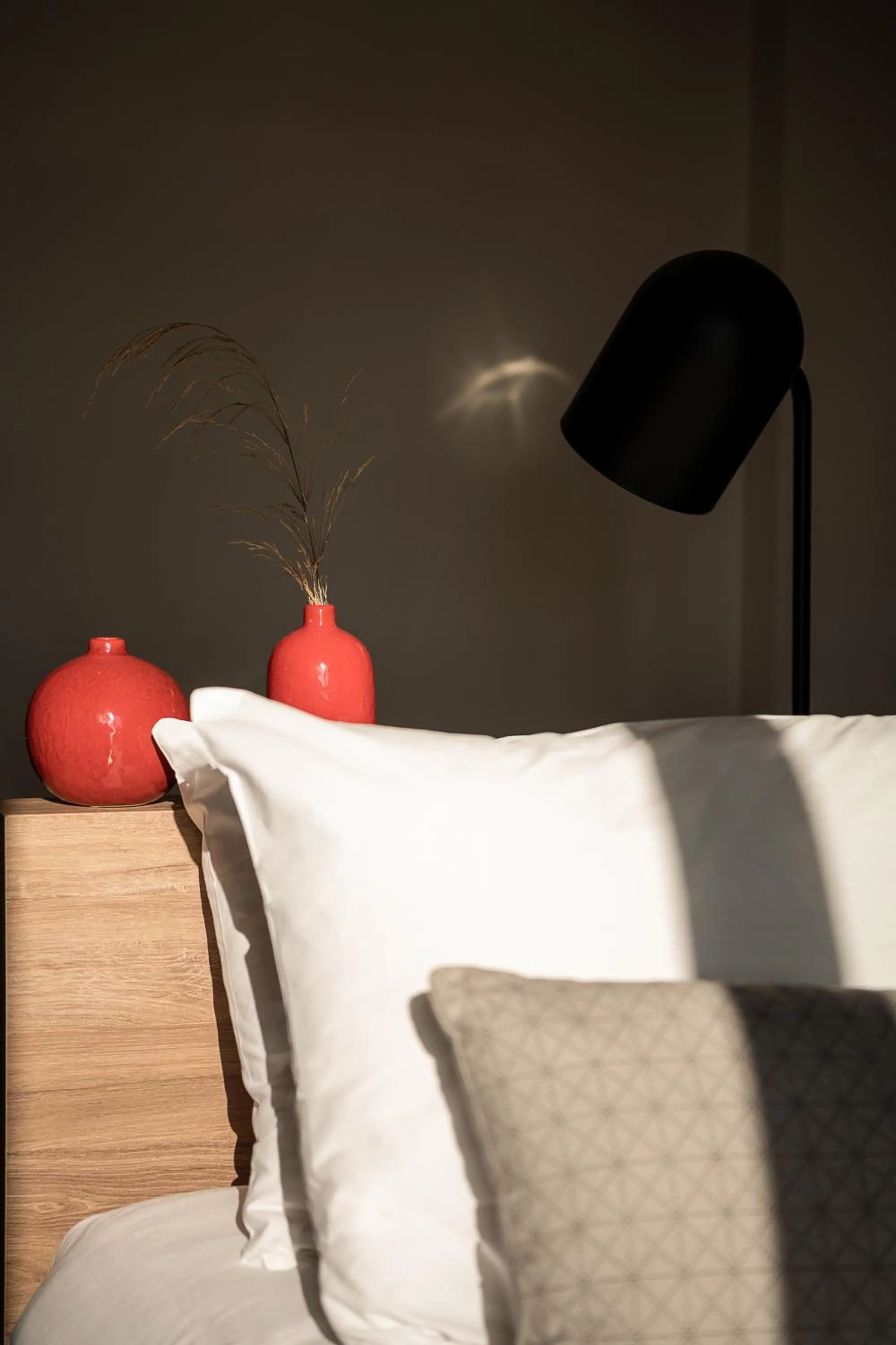 Bed in Amphitrite Hotel