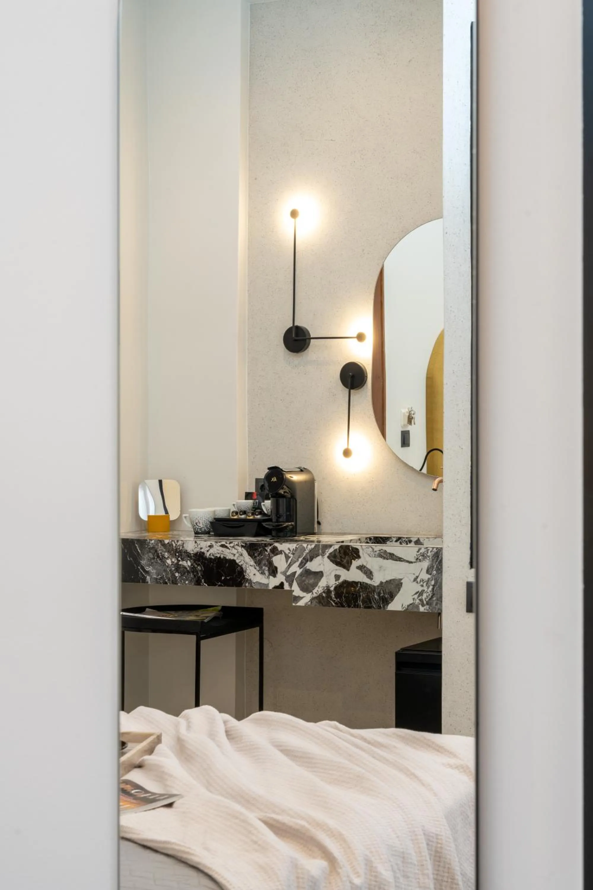 Bed in Amphitrite Hotel