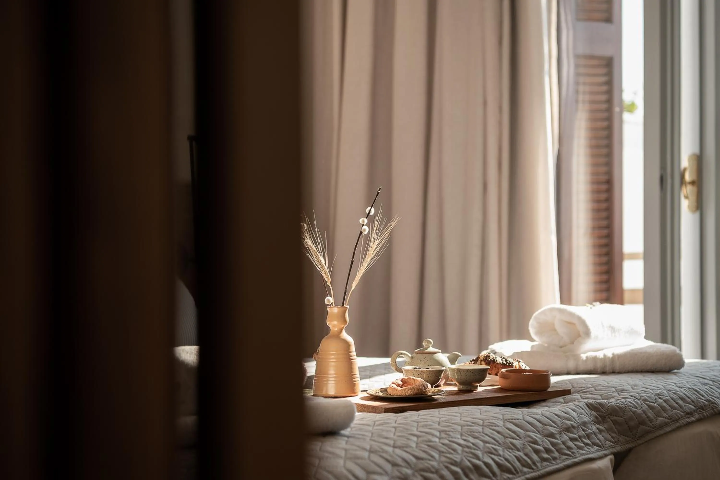 Bed in Amphitrite Hotel