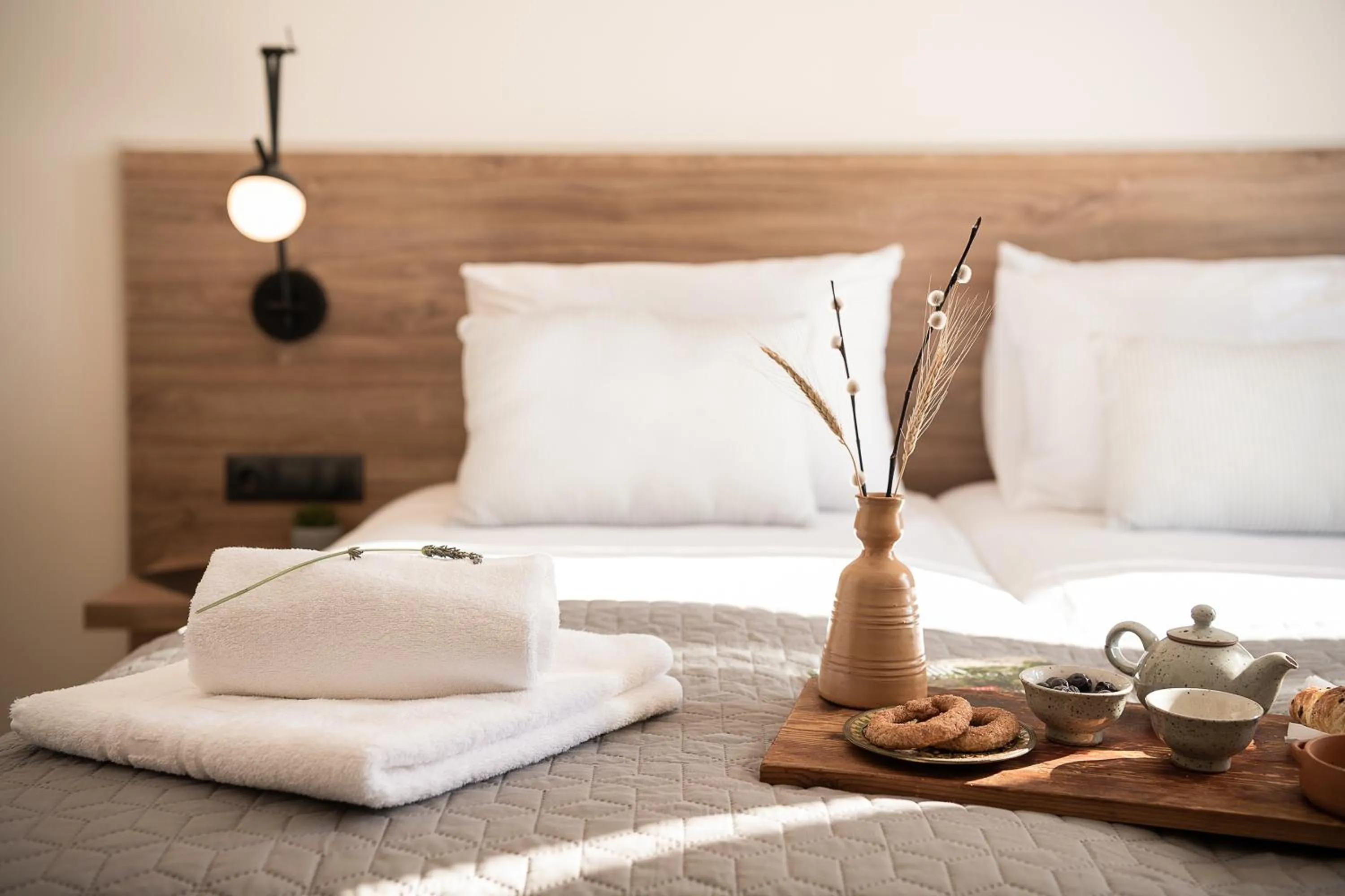 Bed in Amphitrite Hotel