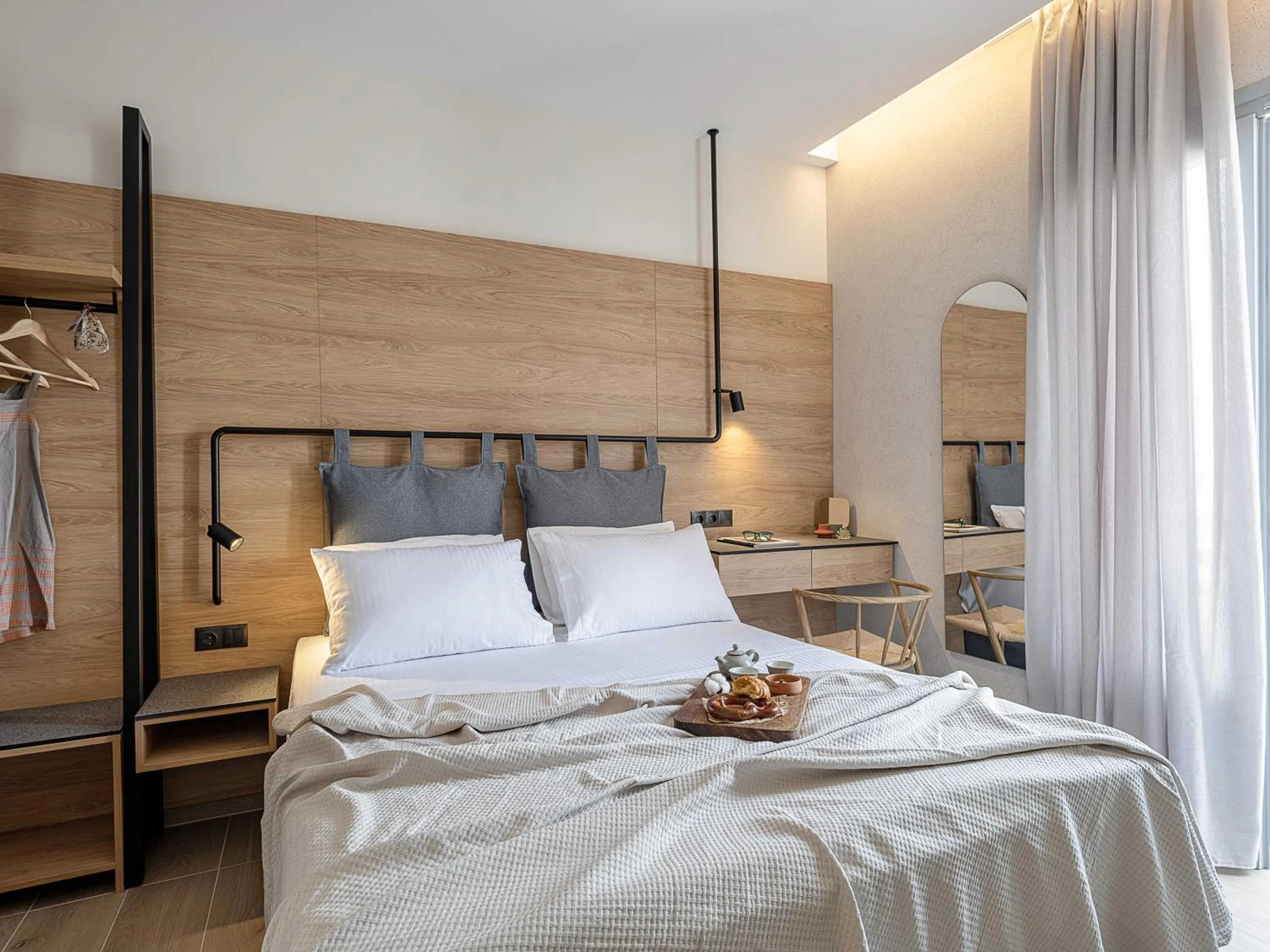 Bed in Amphitrite Hotel