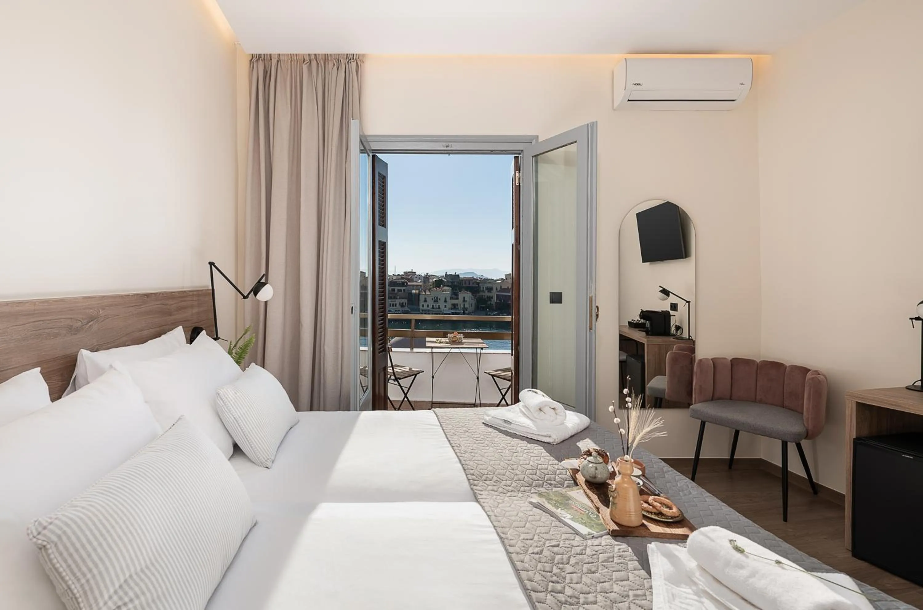 Bed in Amphitrite Hotel