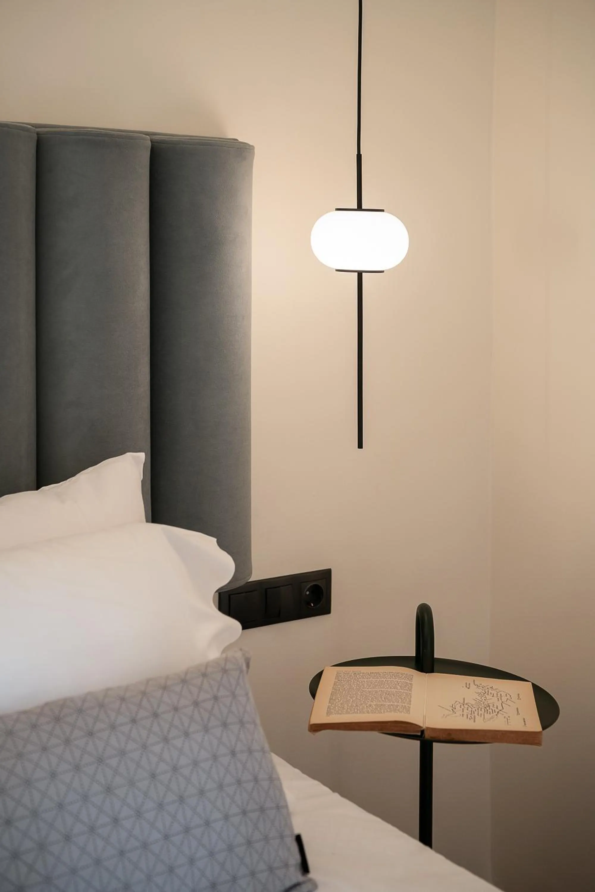 Bed in Amphitrite Hotel