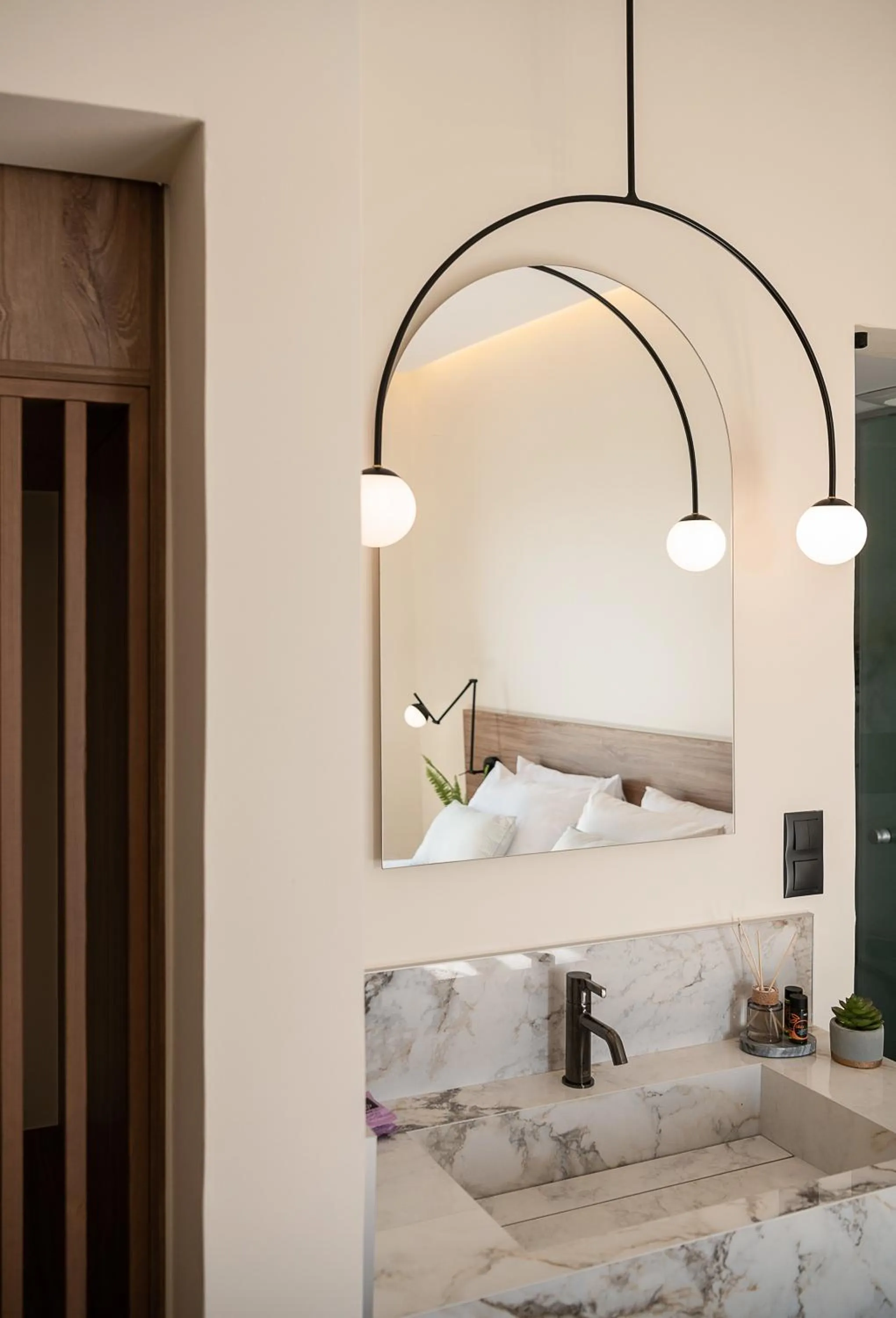 Bed in Amphitrite Hotel