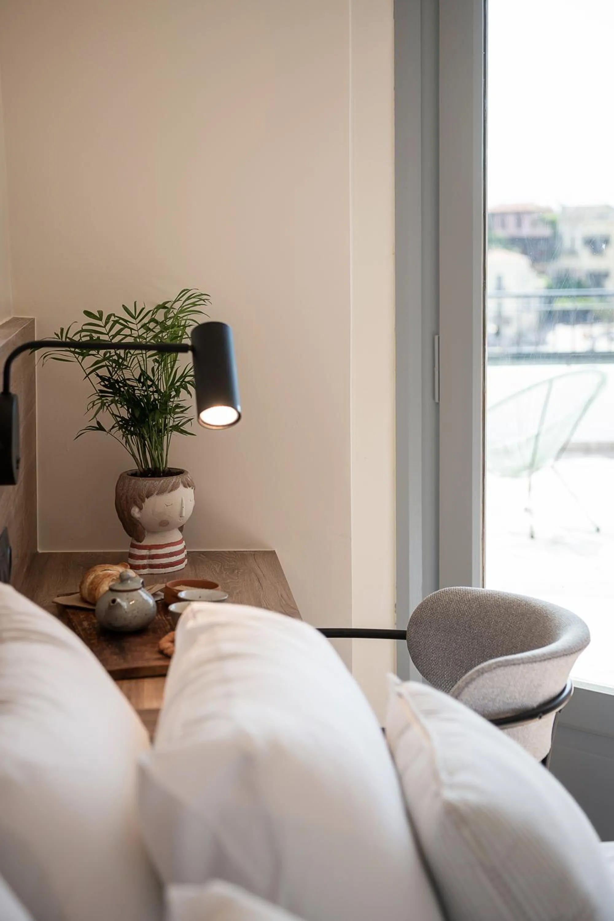 Bed in Amphitrite Hotel