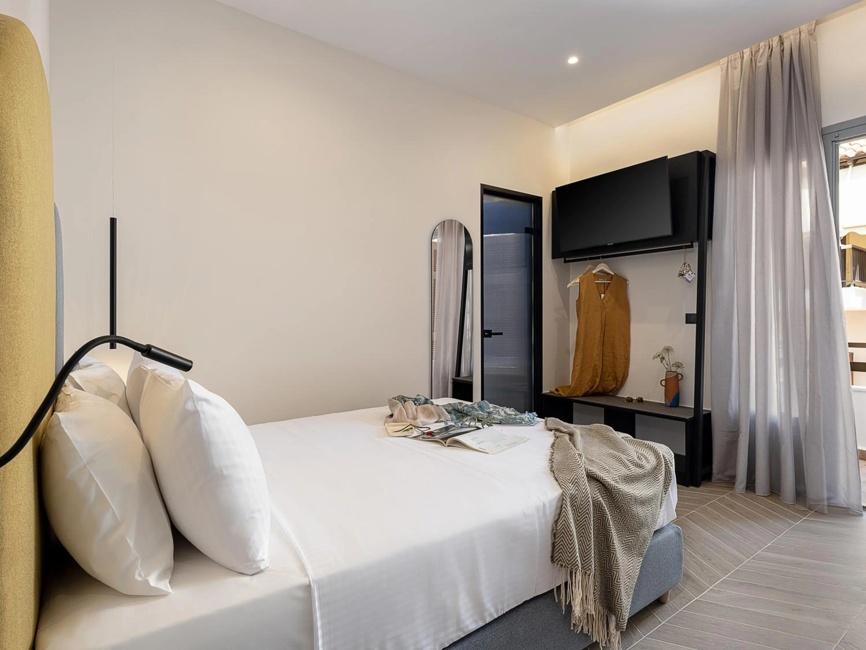 Bed in Amphitrite Hotel