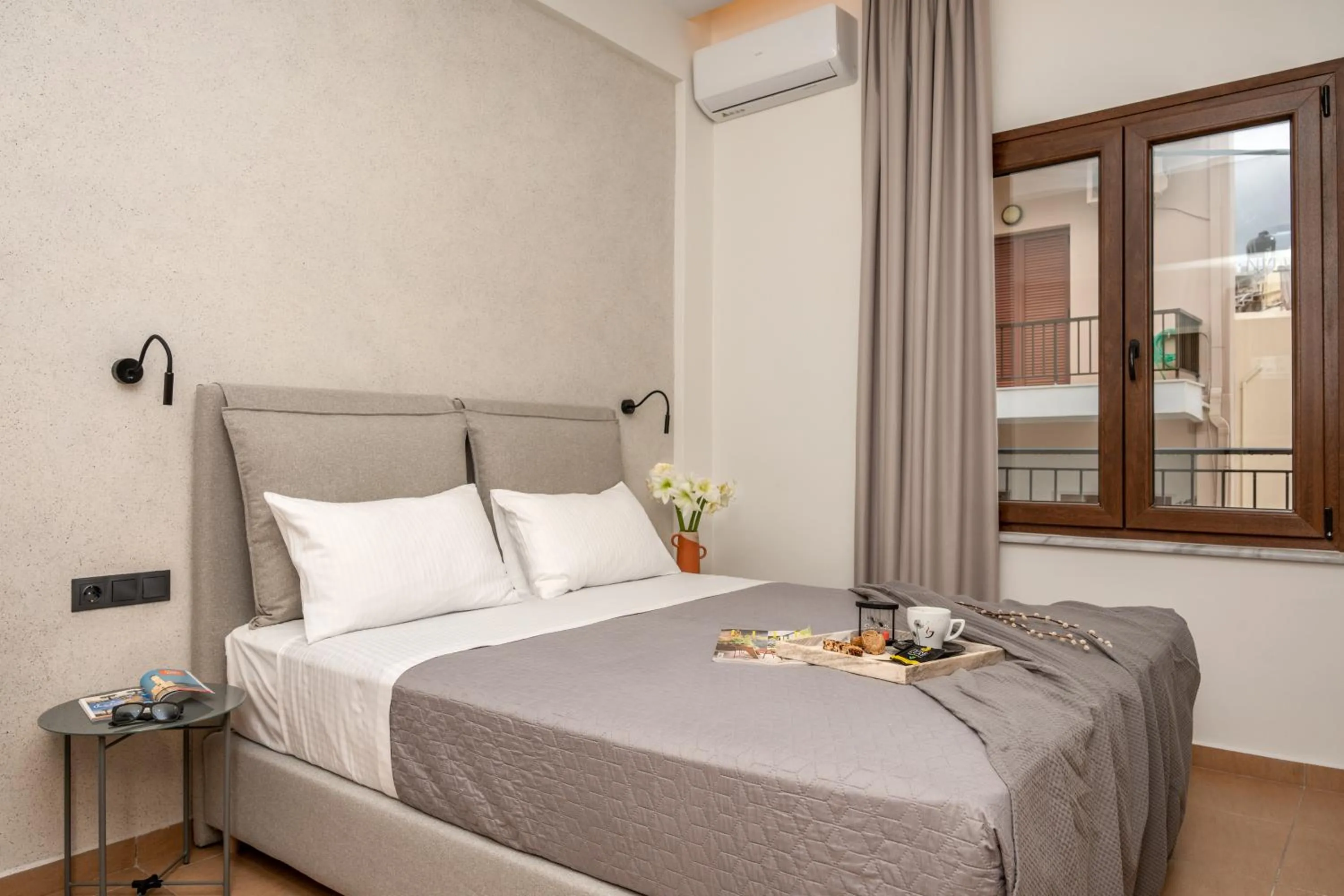 Bed in Amphitrite Hotel