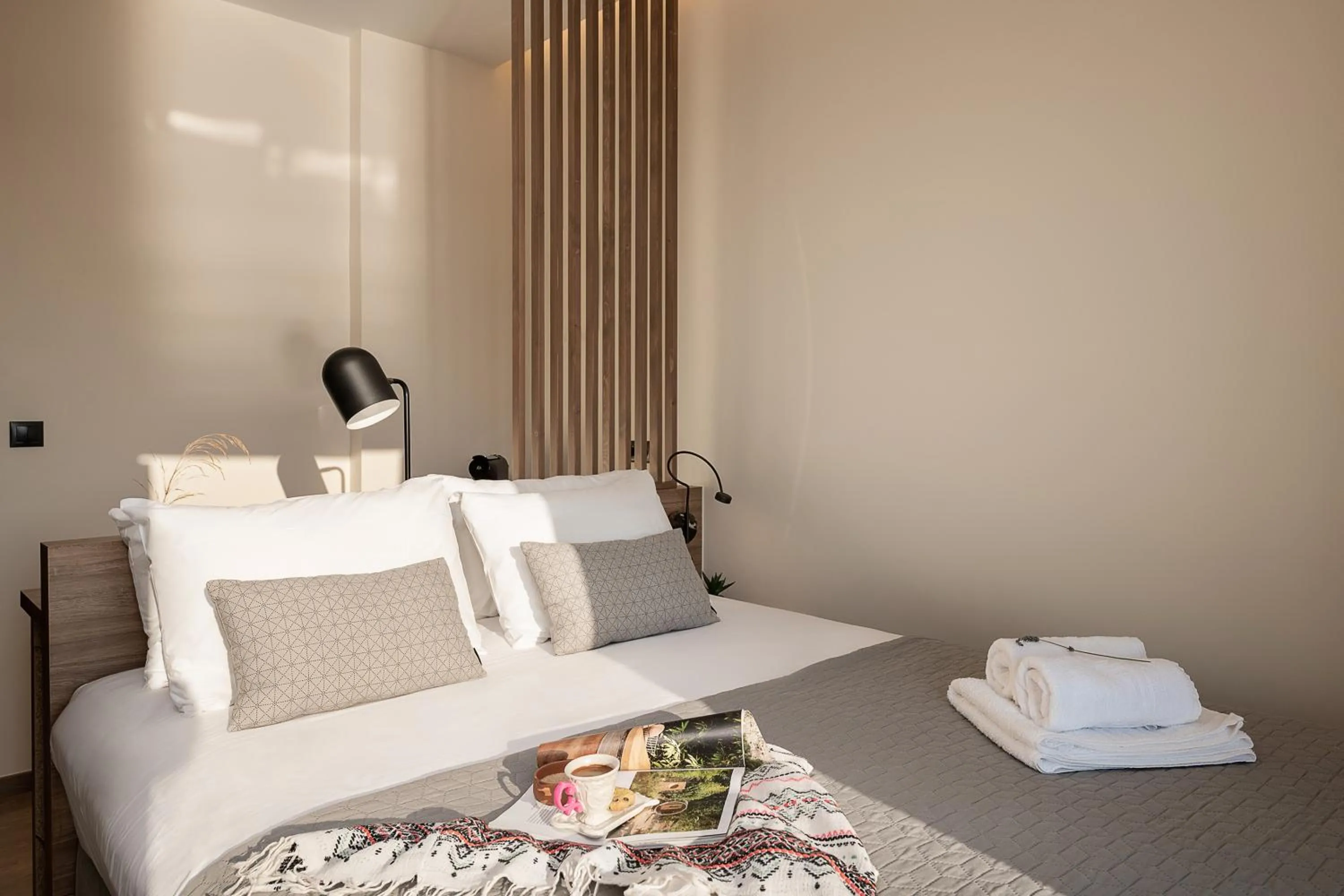 Bed in Amphitrite Hotel