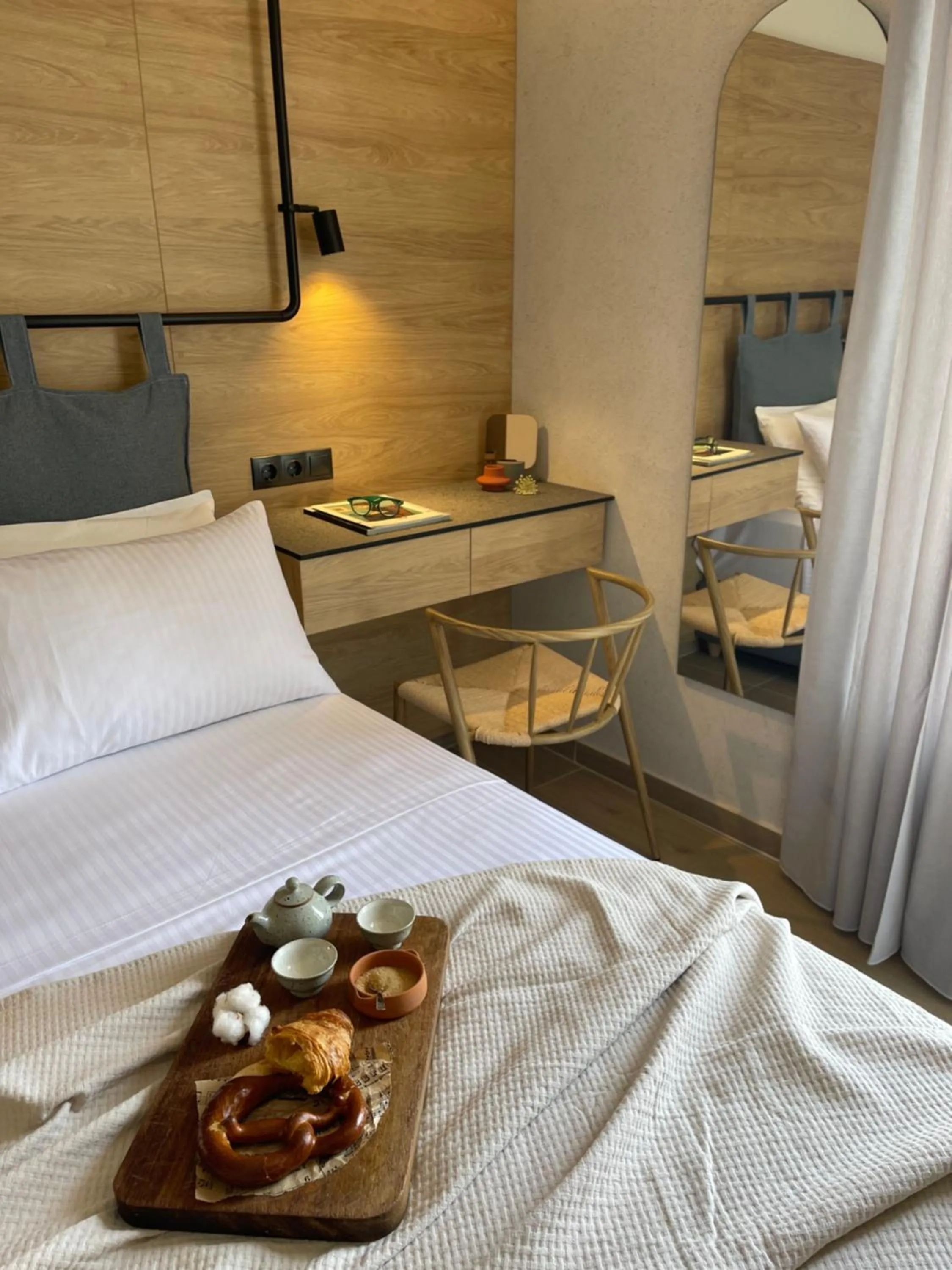 Bed in Amphitrite Hotel