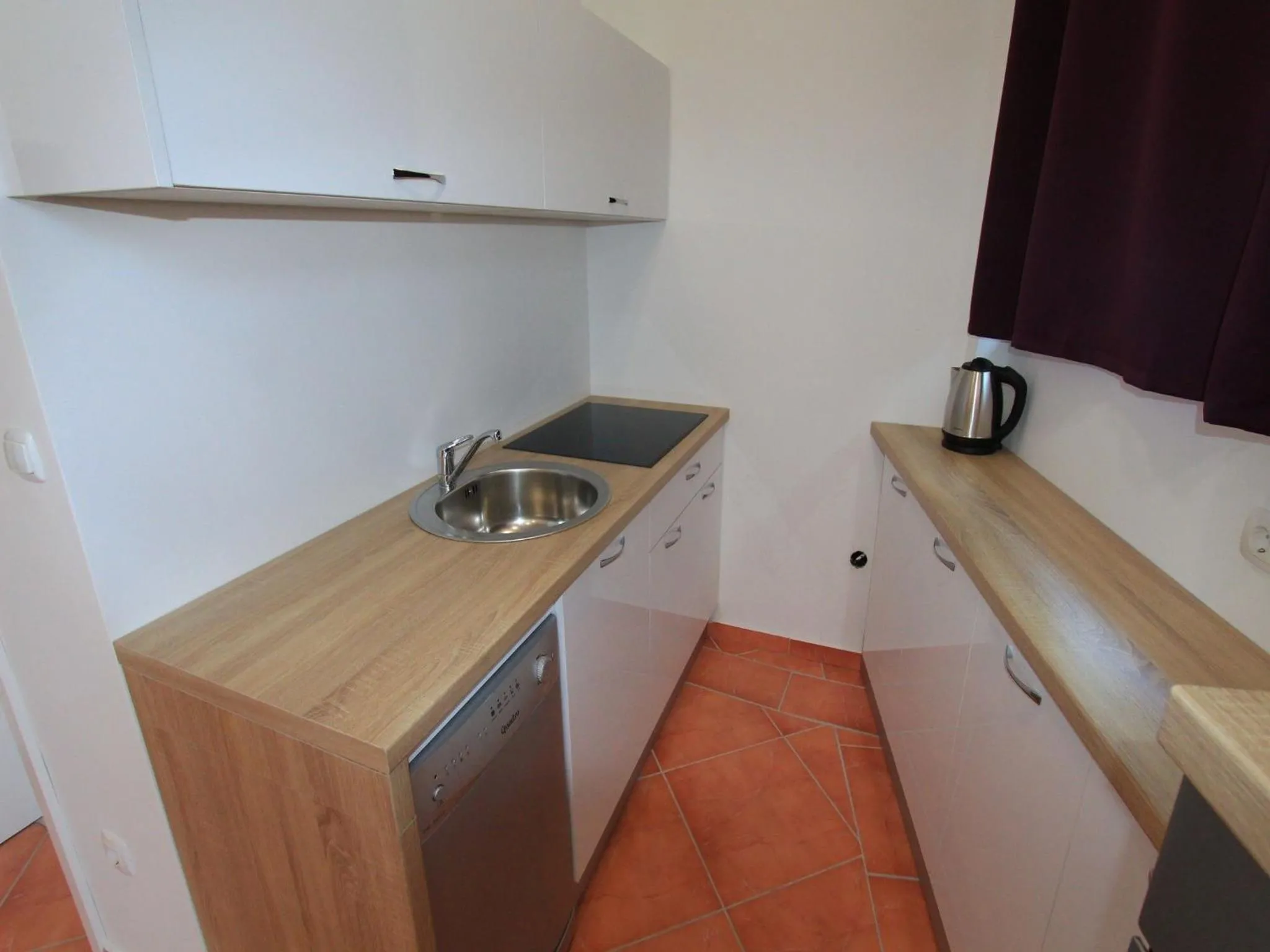Kitchen or kitchenette in Apartments Nero