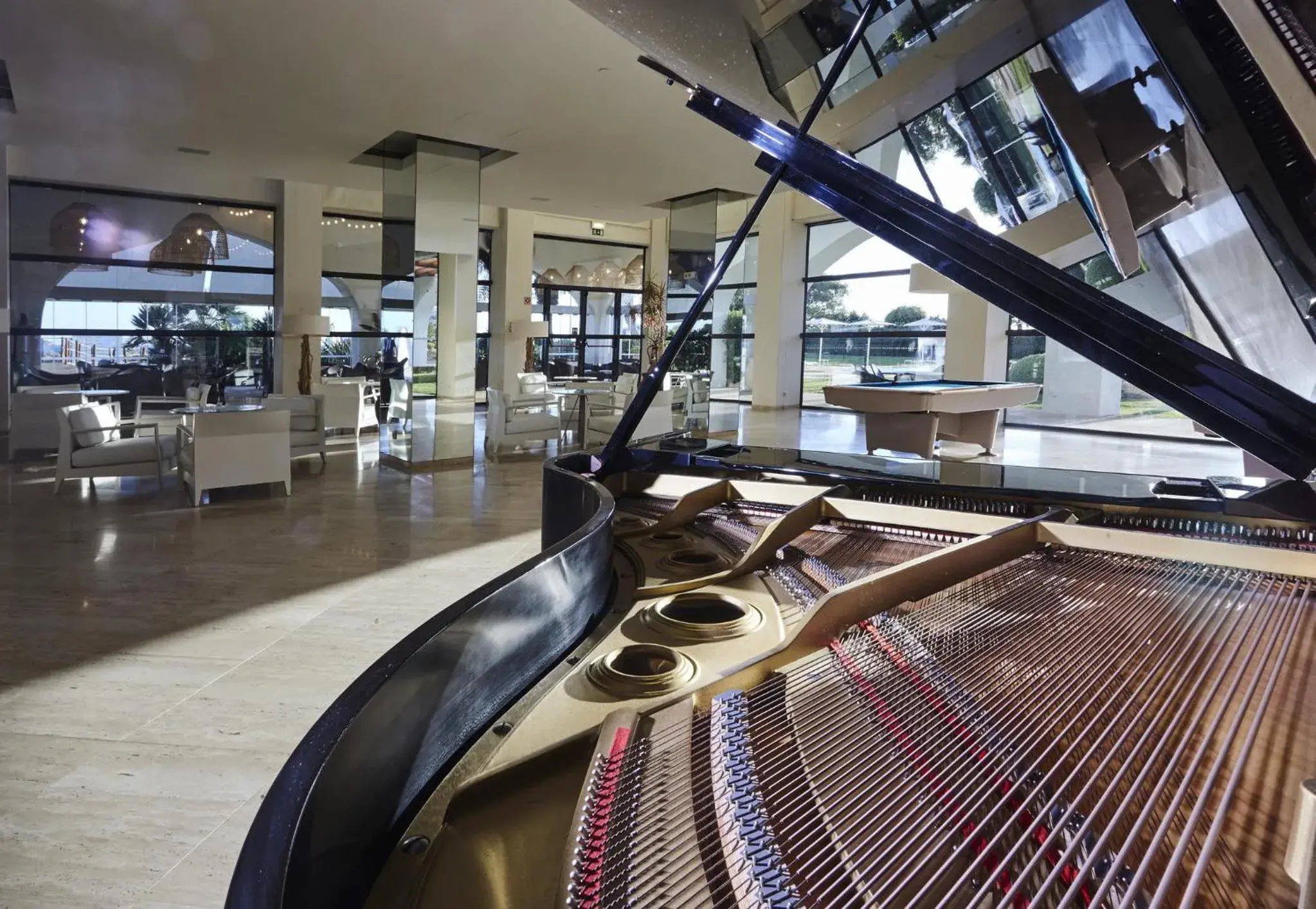 Lounge or bar in Crowne Plaza Vilamoura - Algarve by IHG Lounge or bar in Crowne Plaza Vilamoura - Algarve by IHG