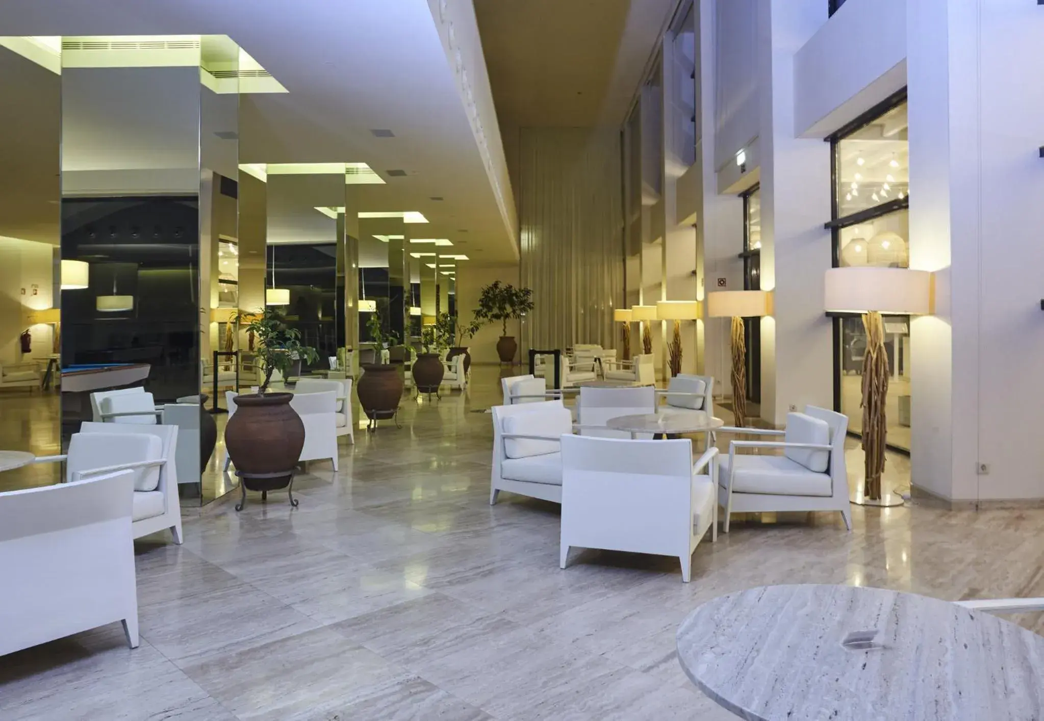 Lounge or bar in Crowne Plaza Vilamoura - Algarve by IHG Lounge or bar in Crowne Plaza Vilamoura - Algarve by IHG