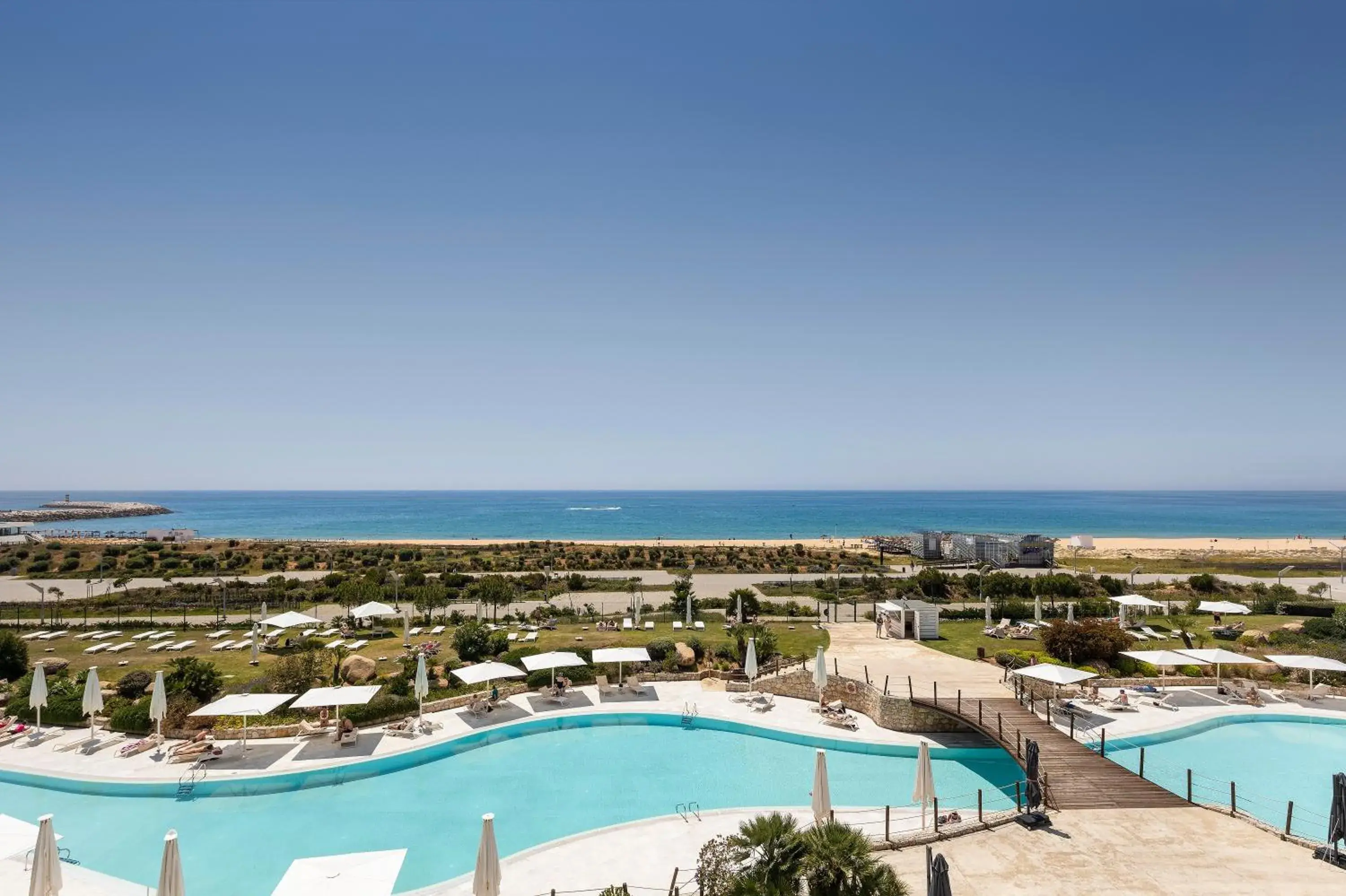 Swimming pool in Crowne Plaza Vilamoura - Algarve by IHG Swimming pool in Crowne Plaza Vilamoura - Algarve by IHG