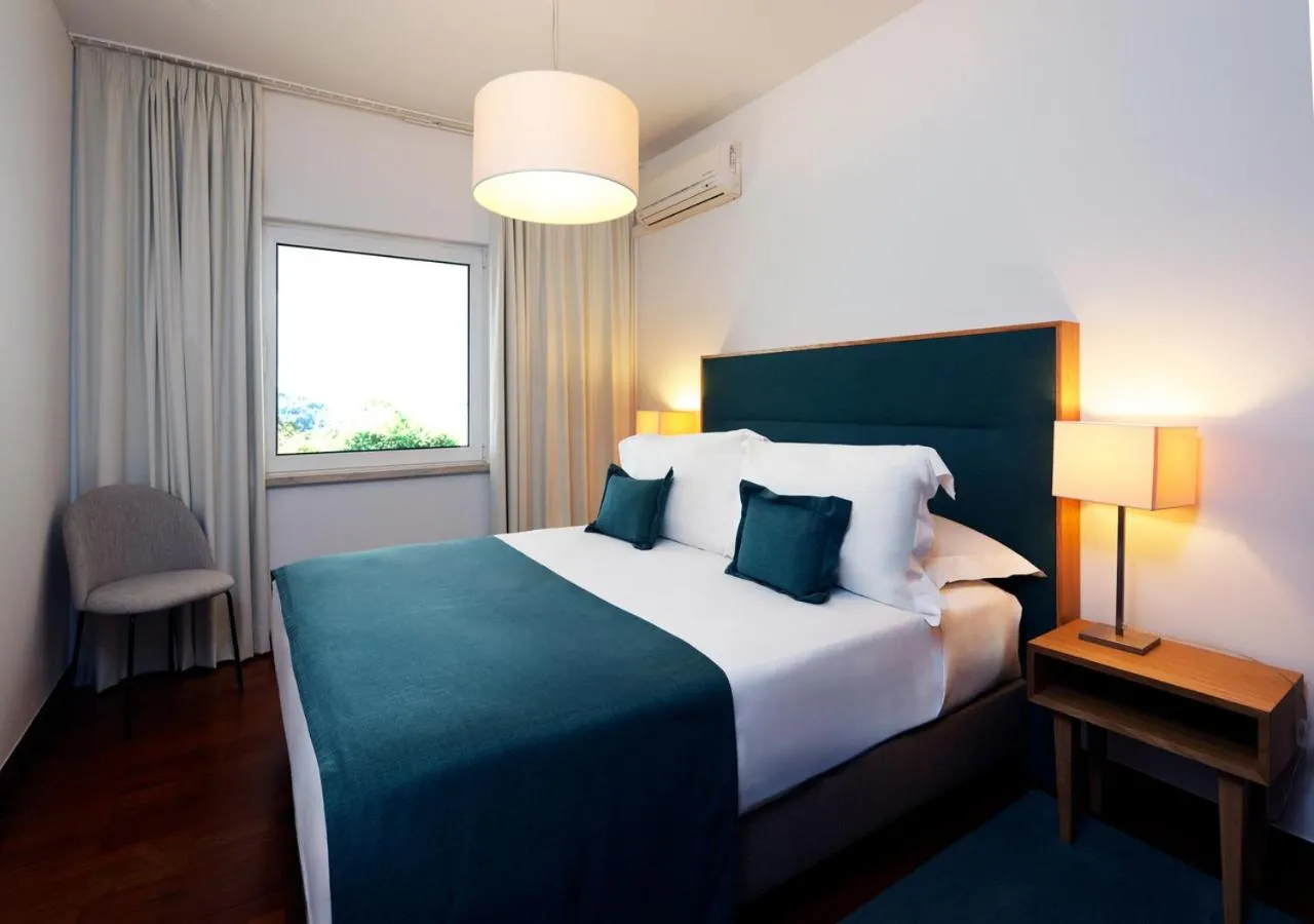 Bed in Montebelo Aguieira Lake Resort & Spa