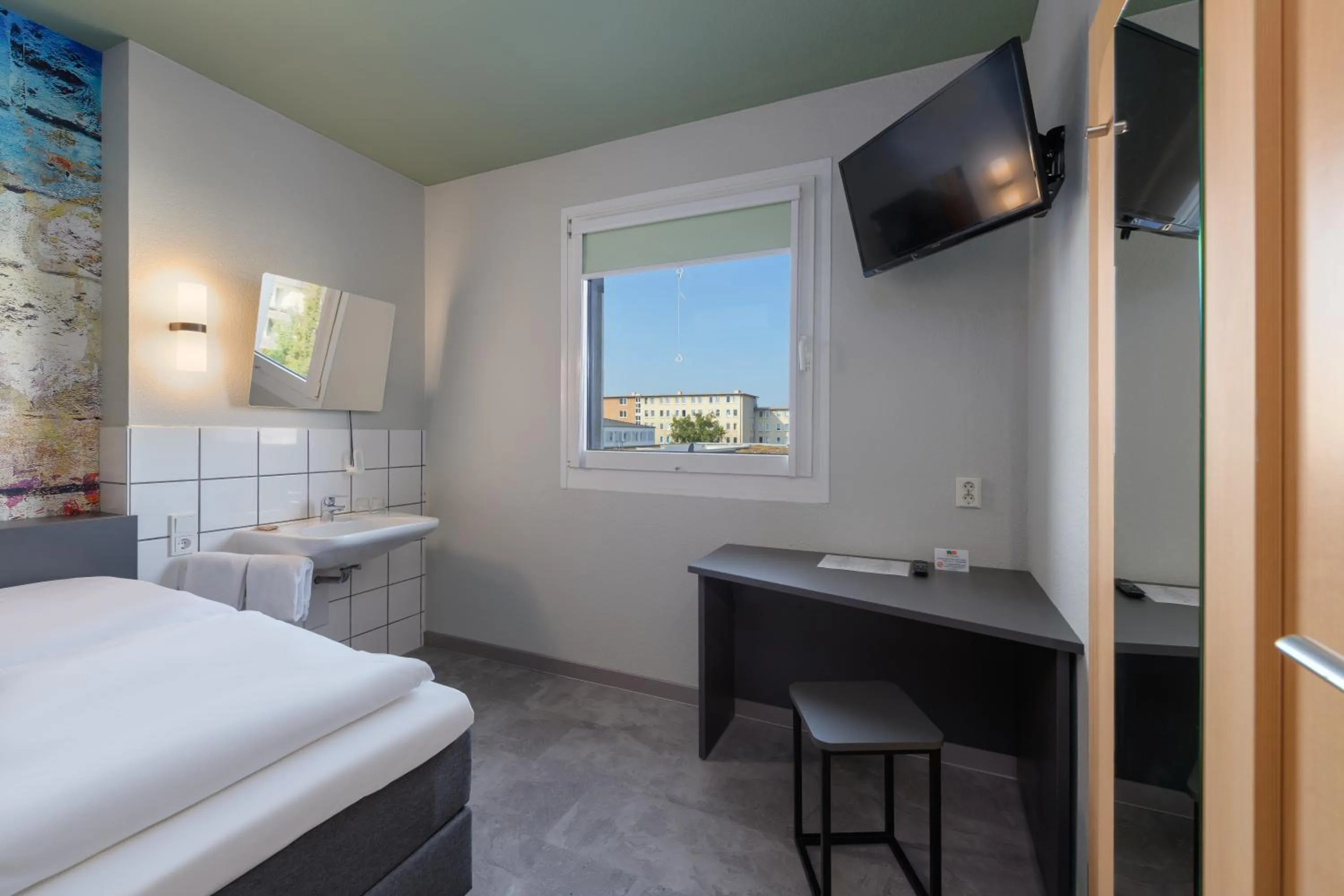 Bed in Felix Hotel Darmstadt