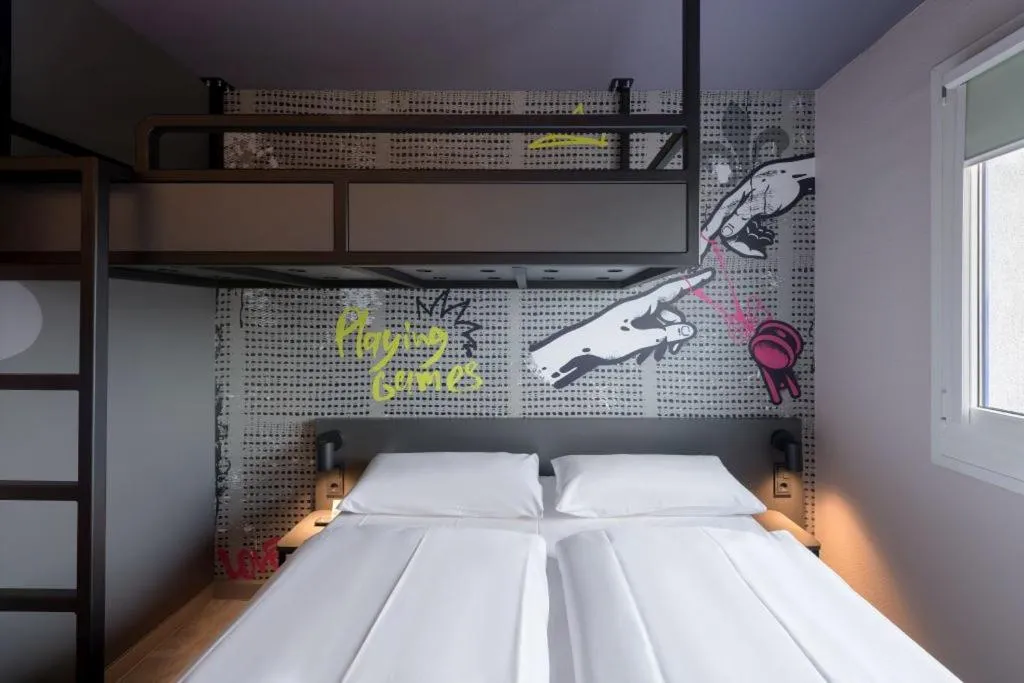 Bed in Felix Hotel Darmstadt