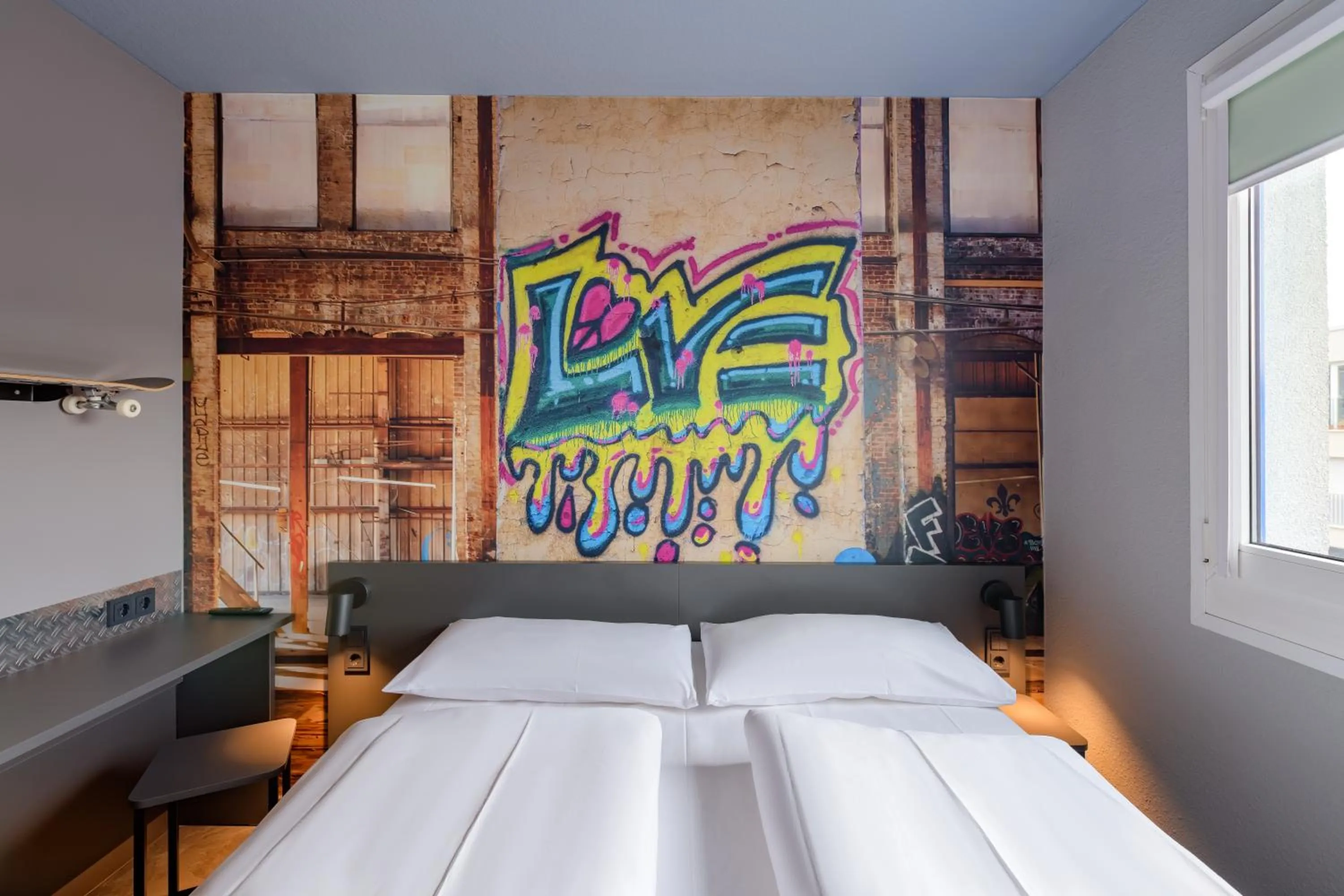 Bed in Felix Hotel Darmstadt