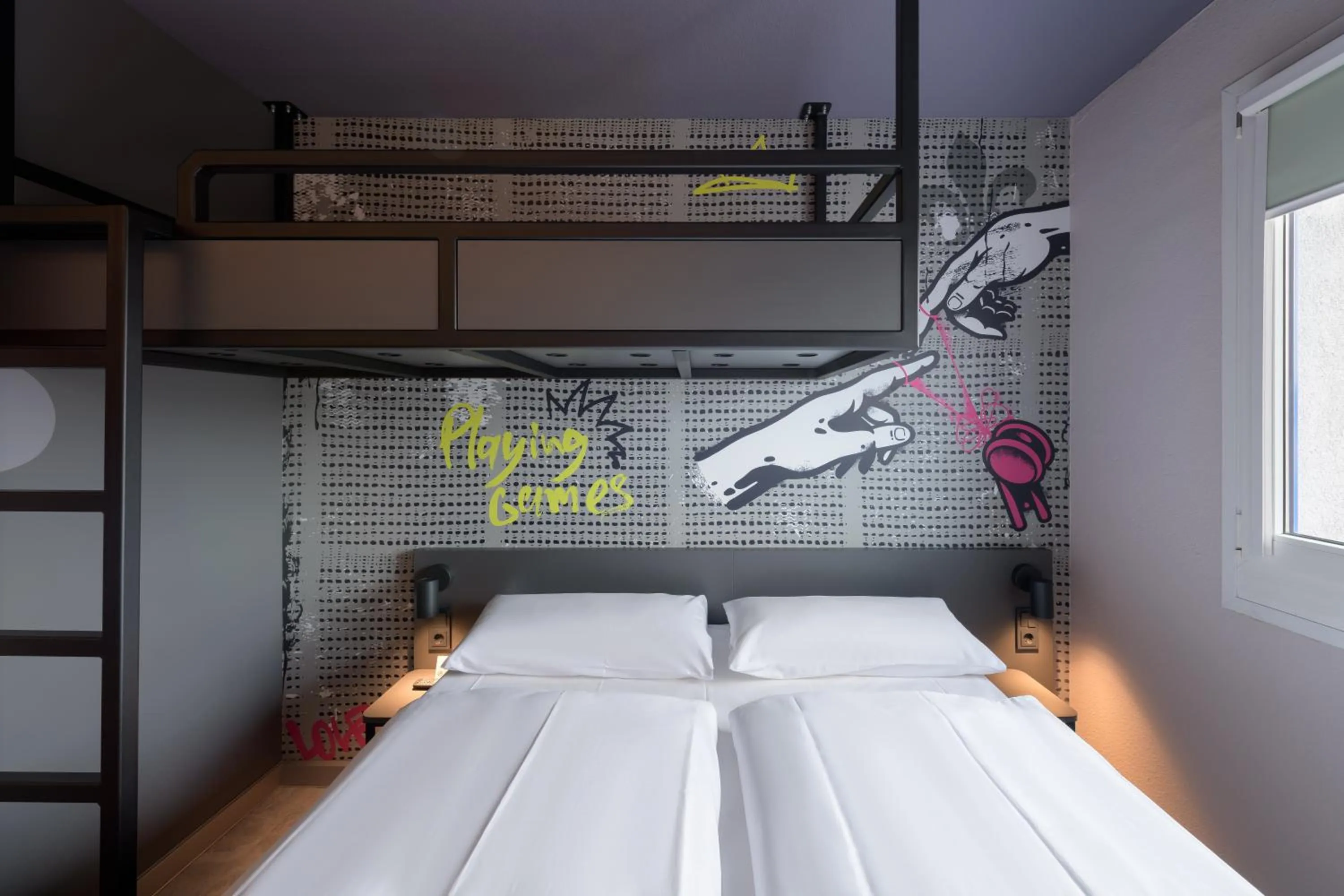 Bed in Felix Hotel Darmstadt