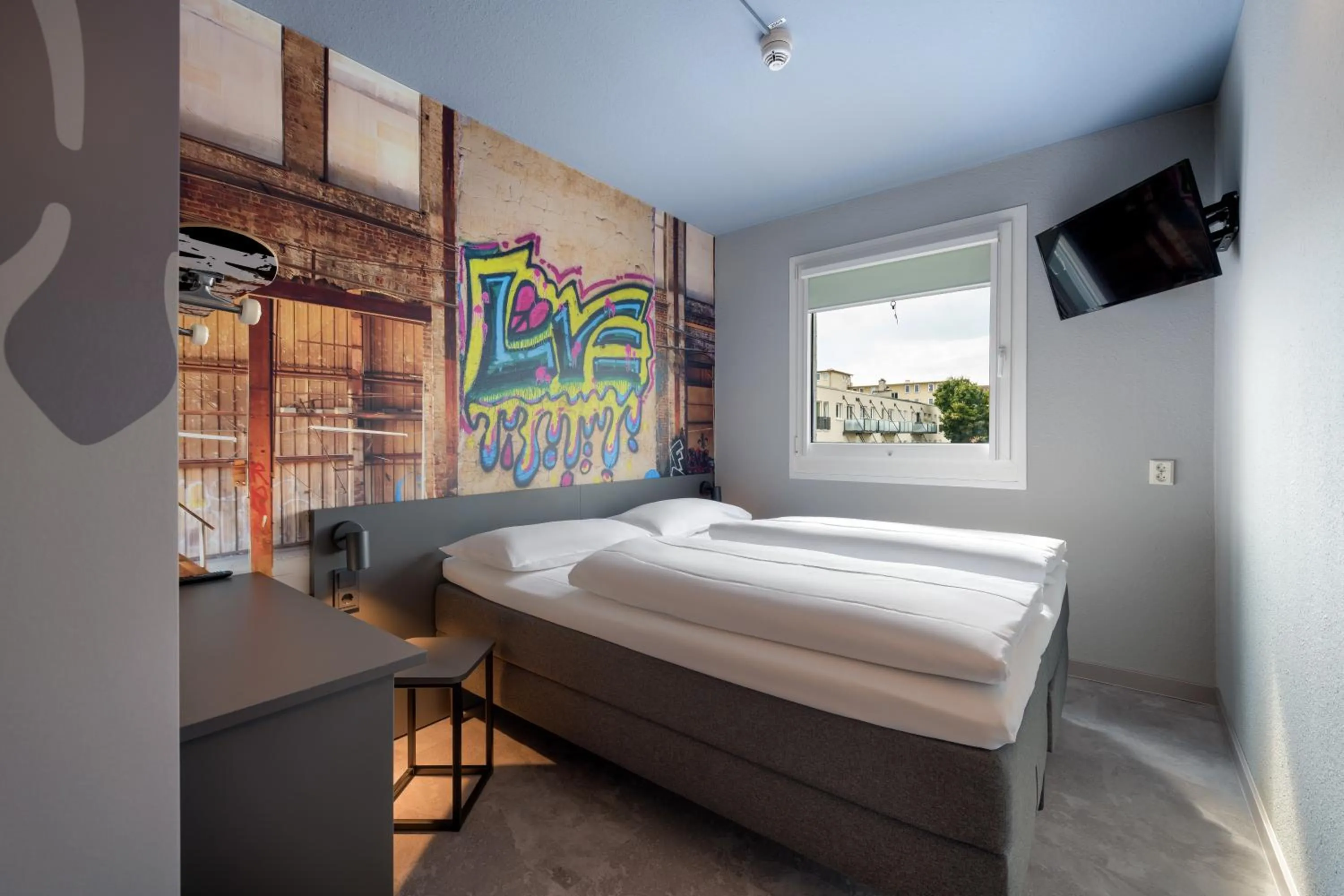 Bed in Felix Hotel Darmstadt