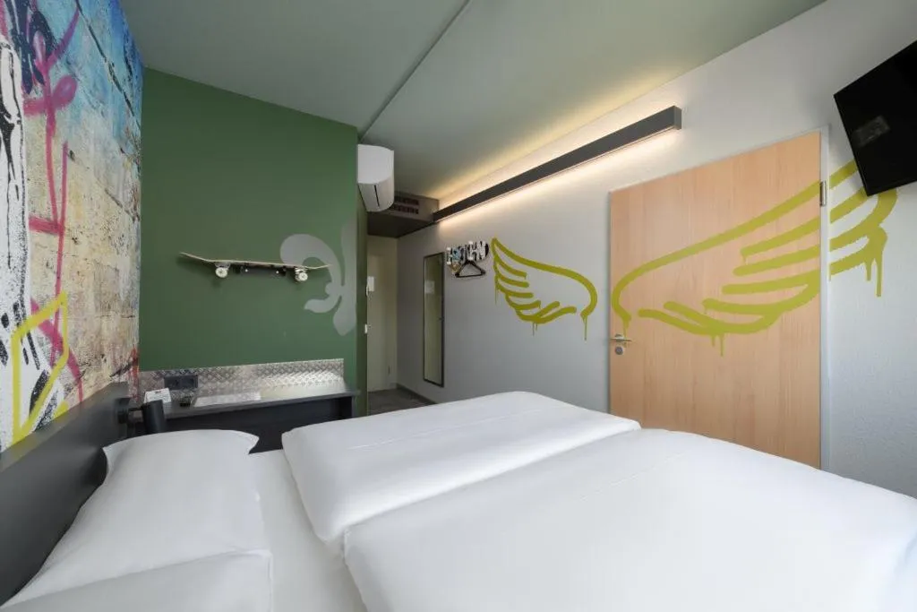 Bed in Felix Hotel Darmstadt