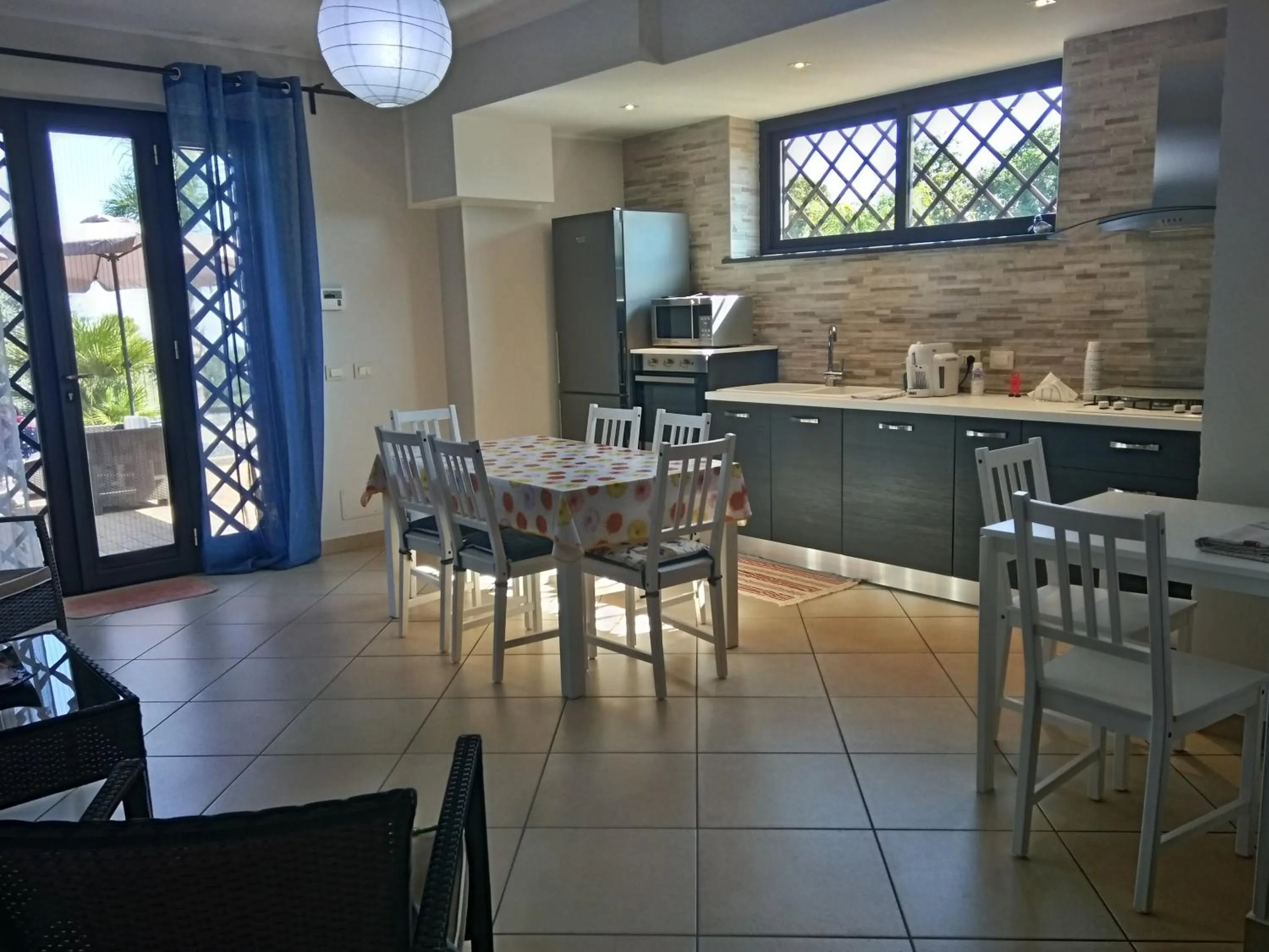 Communal lounge/ TV room in Villa Feluchia Tra Il Mare E Il Vulcano