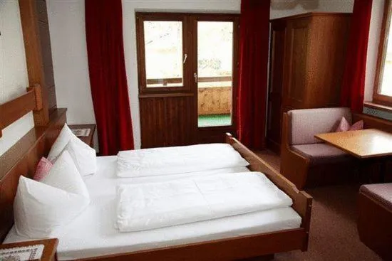 Bed in Appartements Strobl