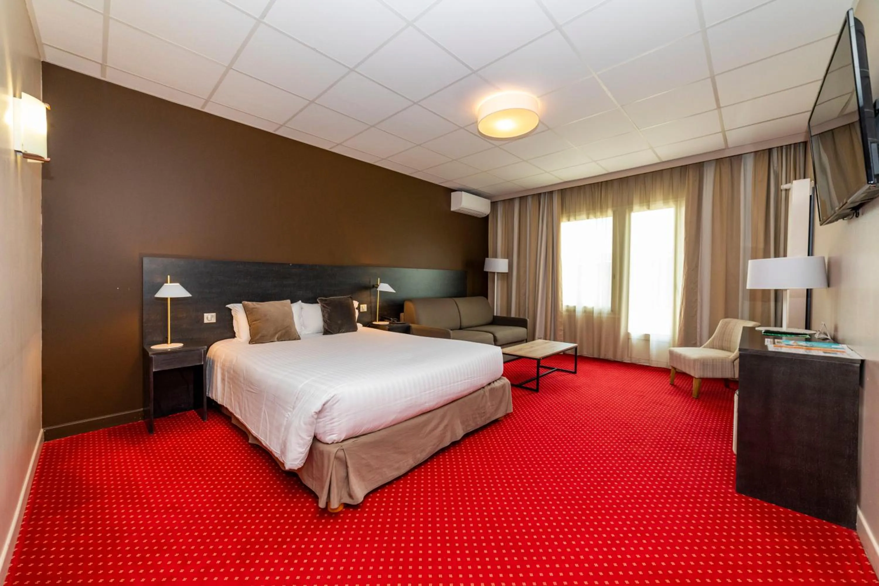 Bed in Hôtel du Casino de Capvern