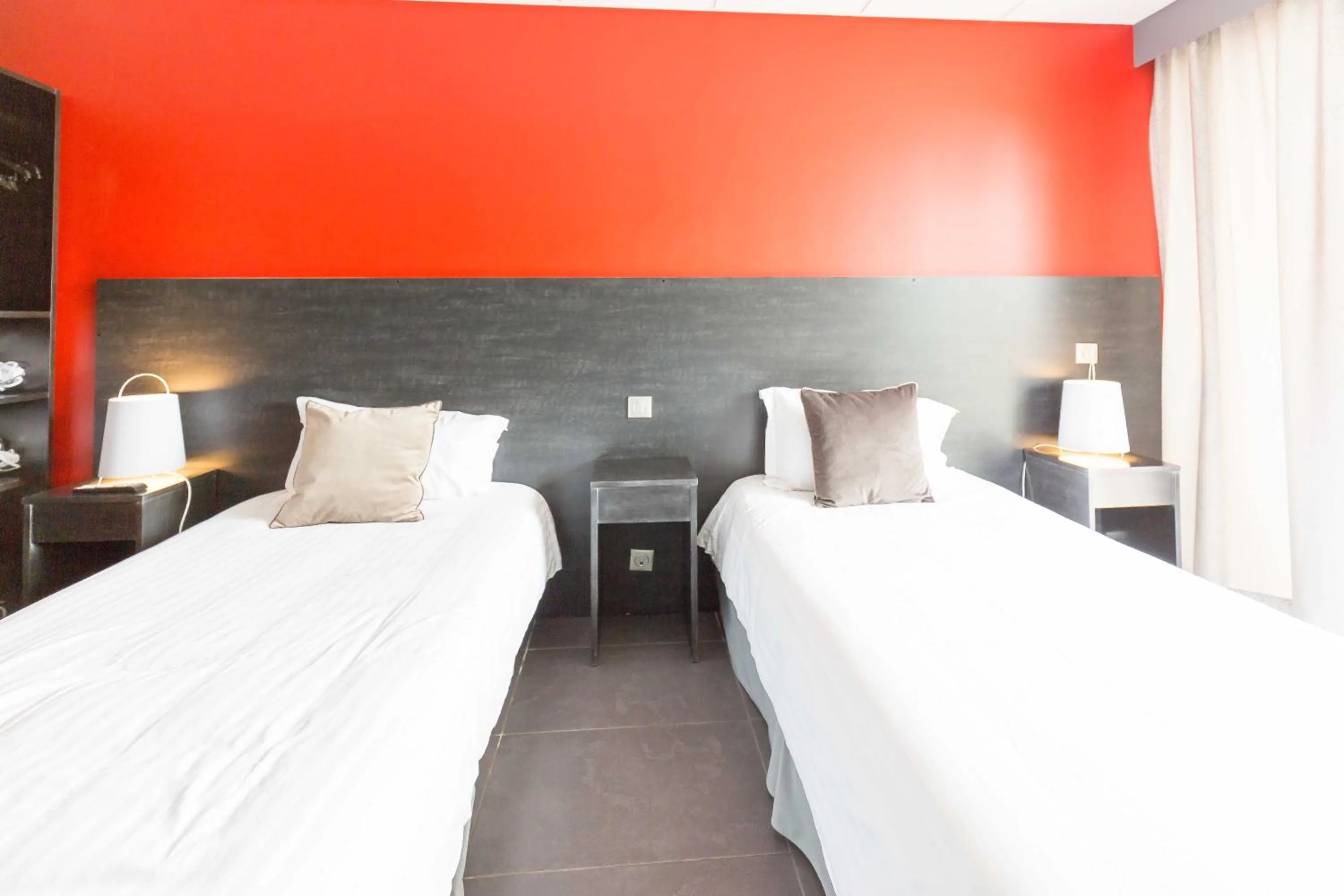 Photo of the whole room, Bed in Hôtel du Casino de Capvern