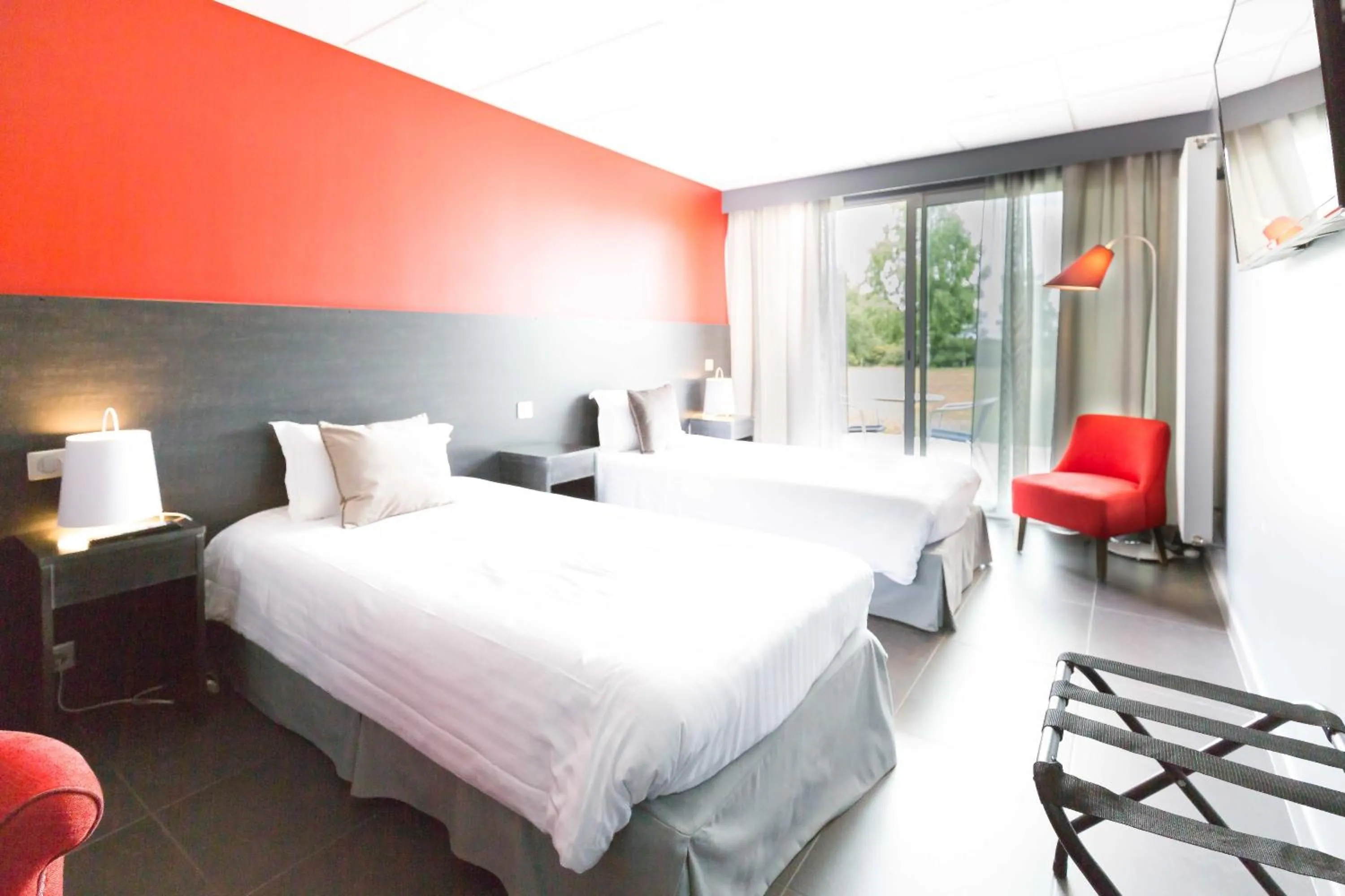 Photo of the whole room, Bed in Hôtel du Casino de Capvern