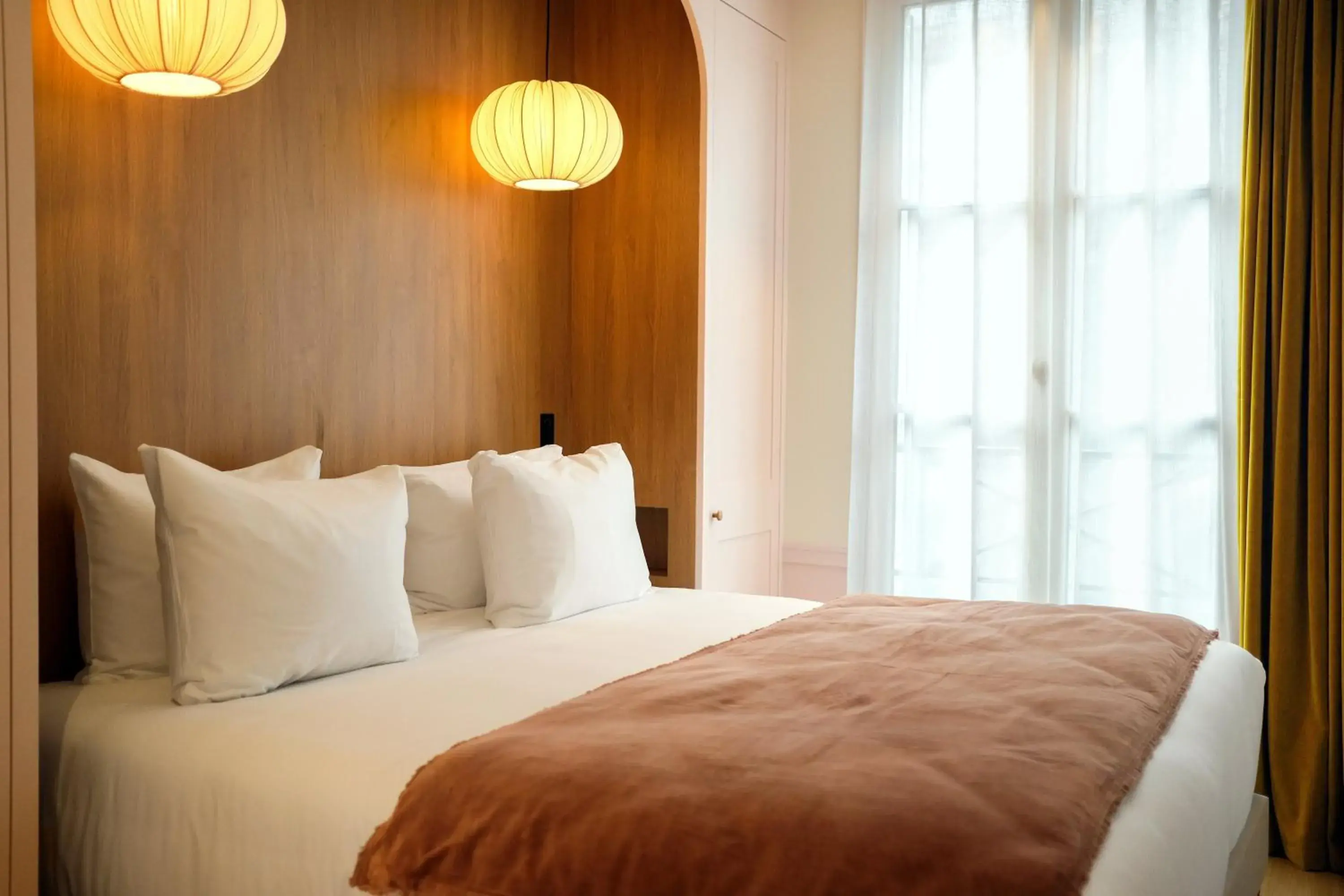 Bed in Hôtel Casimir Bed in Hôtel Casimir