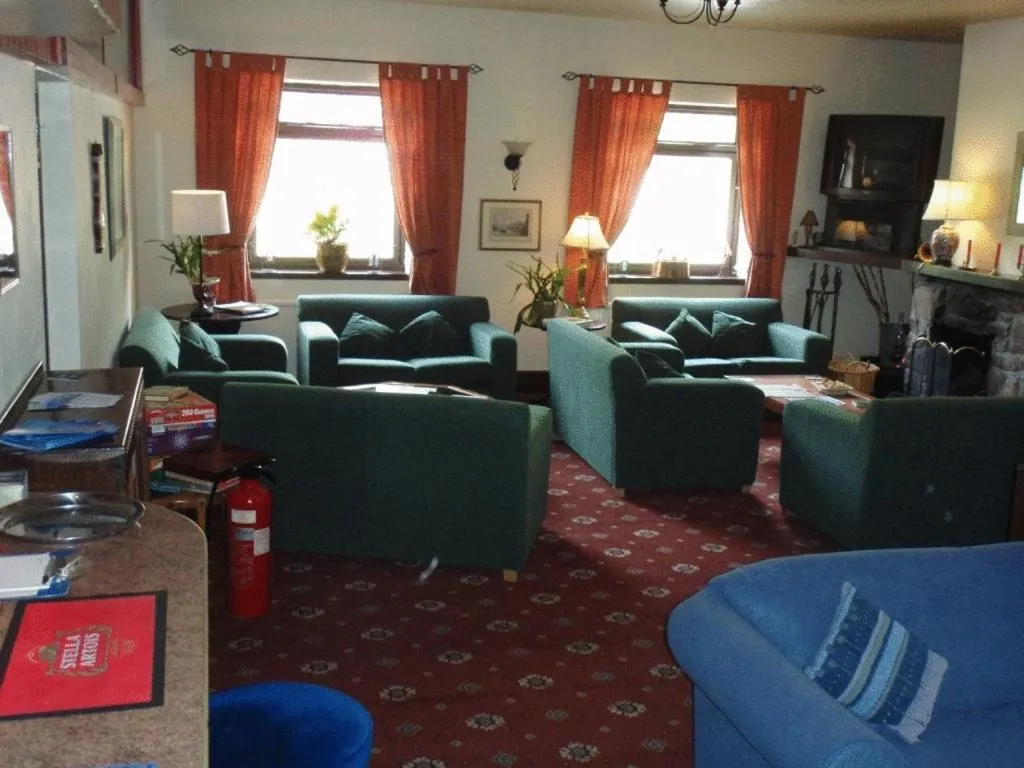 Communal lounge/ TV room in Gairloch Highland Lodge