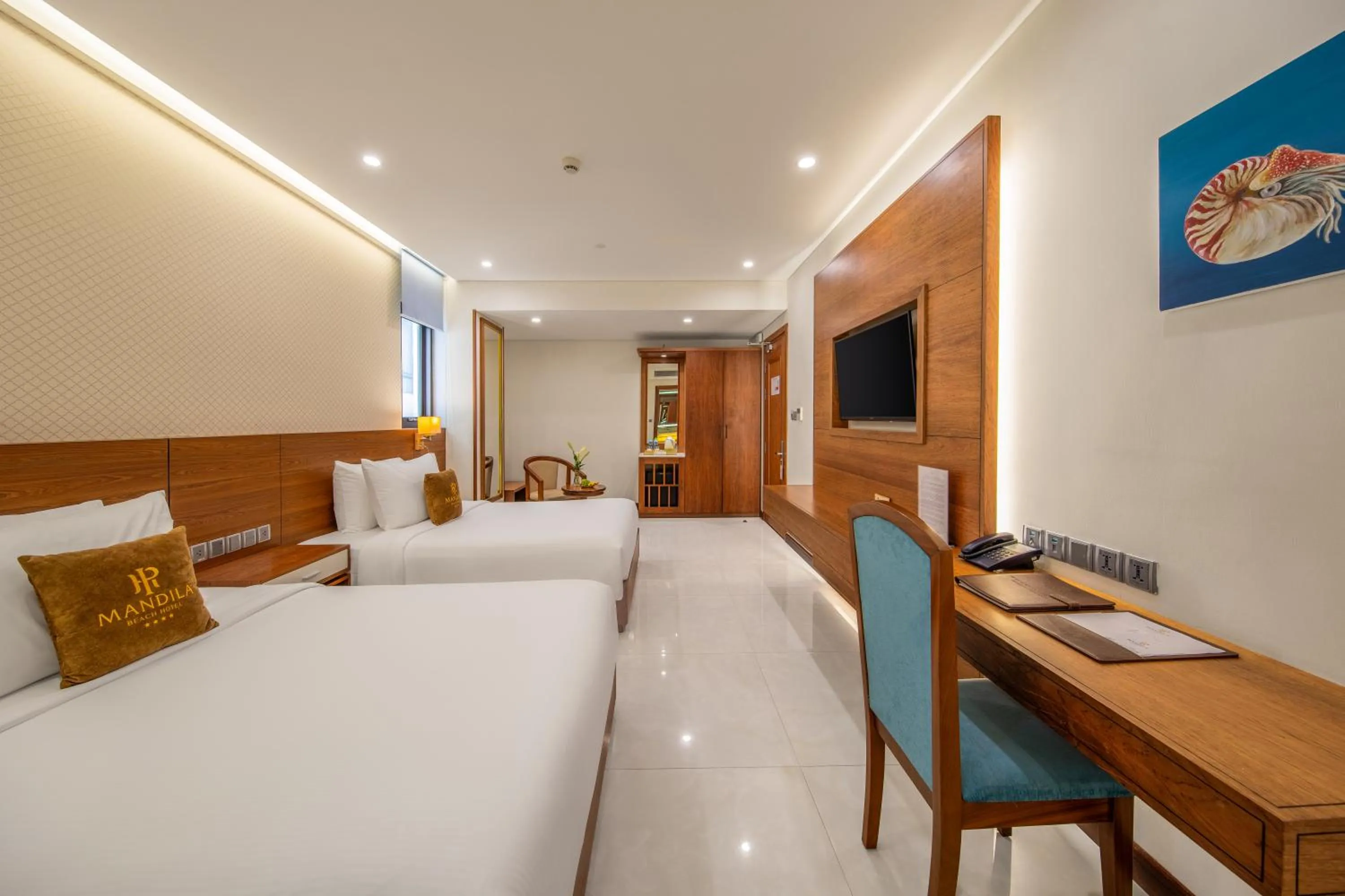 Bed in Mandila Beach Hotel Danang