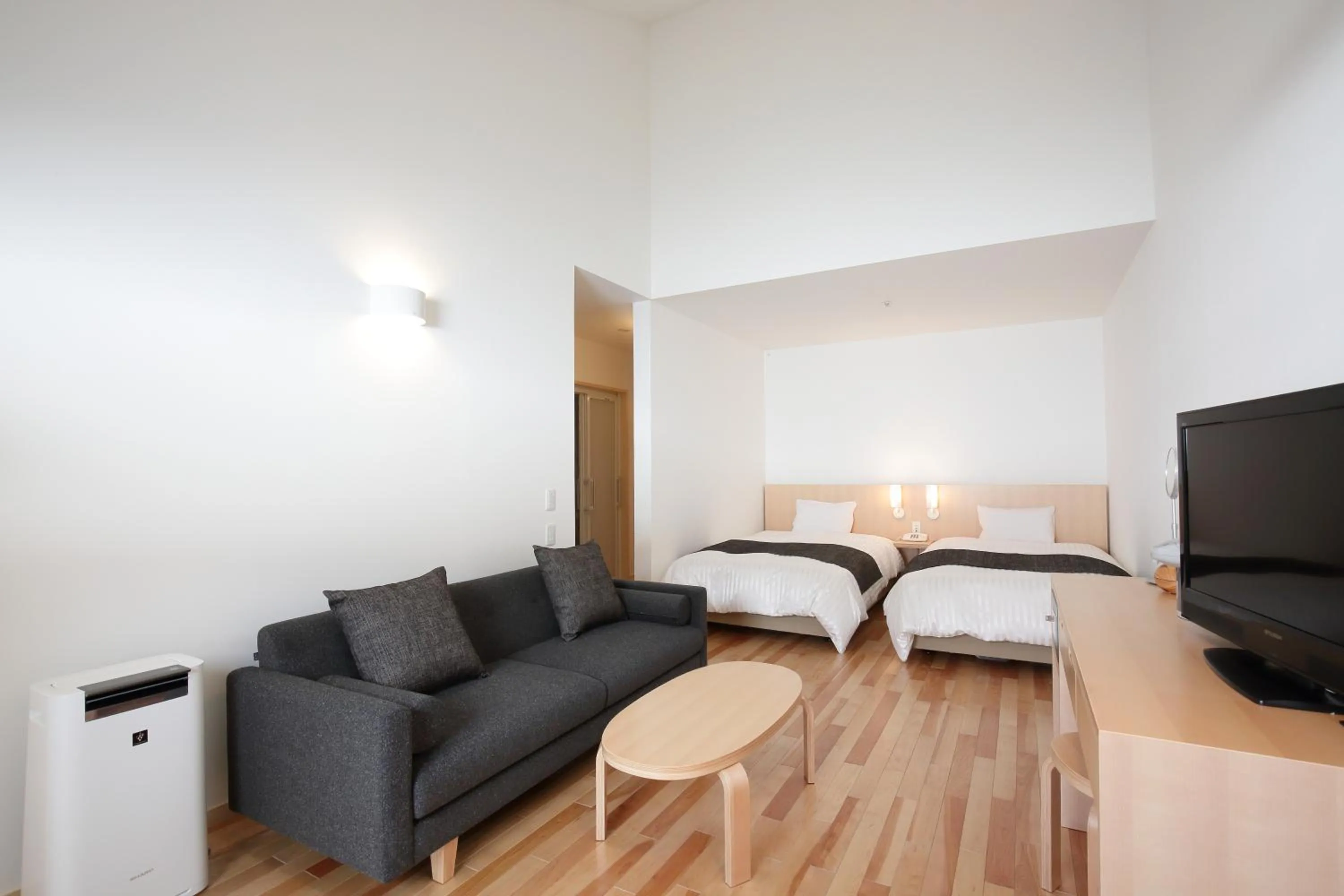 Bed in Log Hotel The Maple Lodge