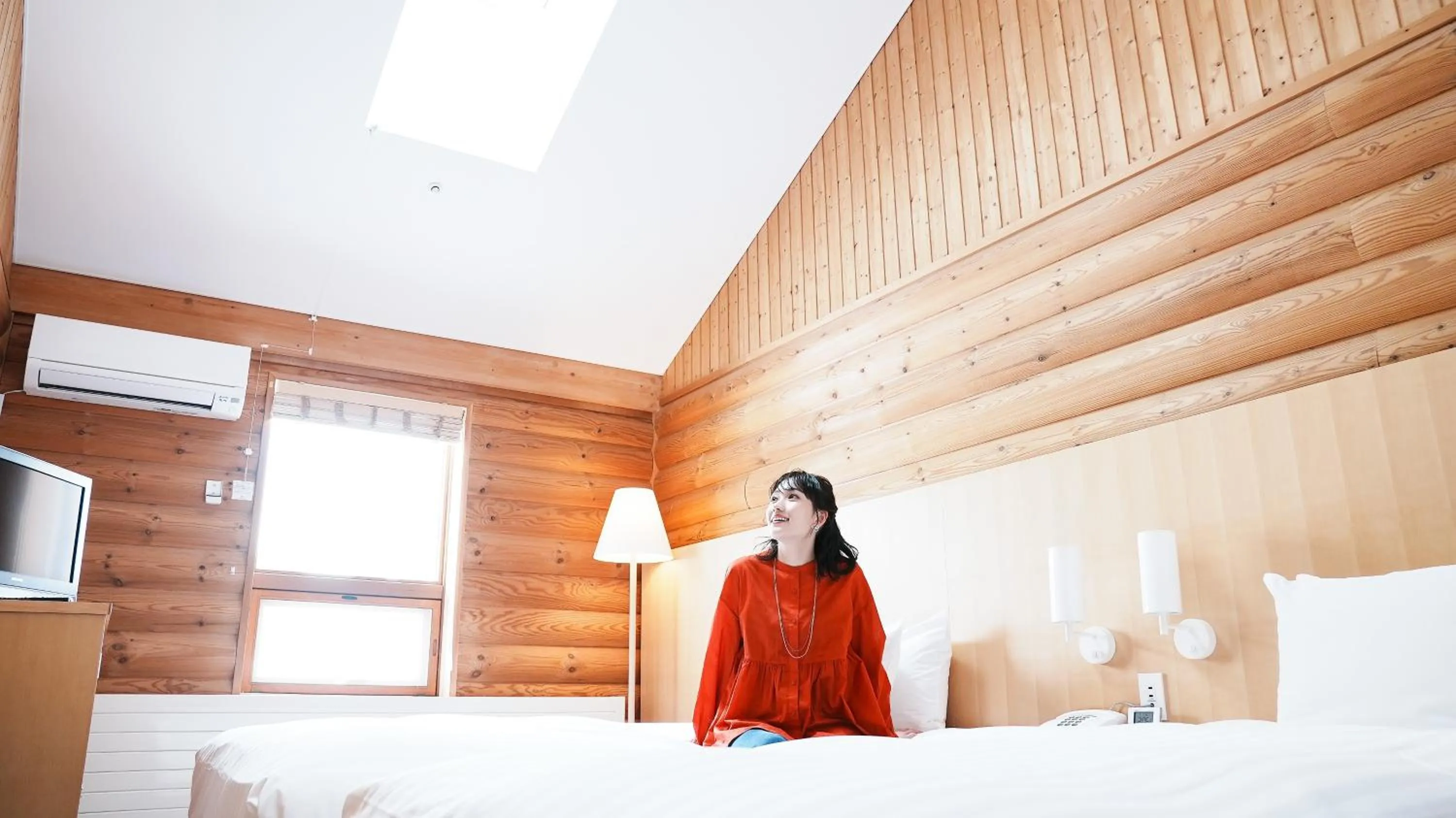 Bed in Log Hotel The Maple Lodge