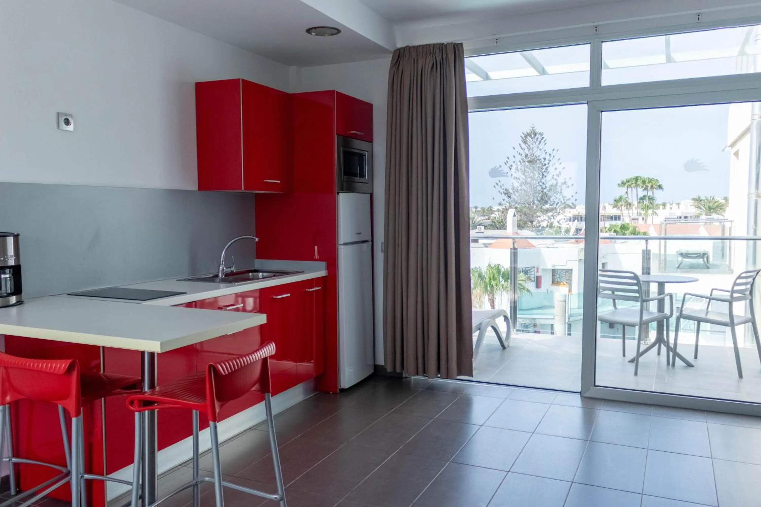 Kitchen or kitchenette in Apartamentos El Palmar