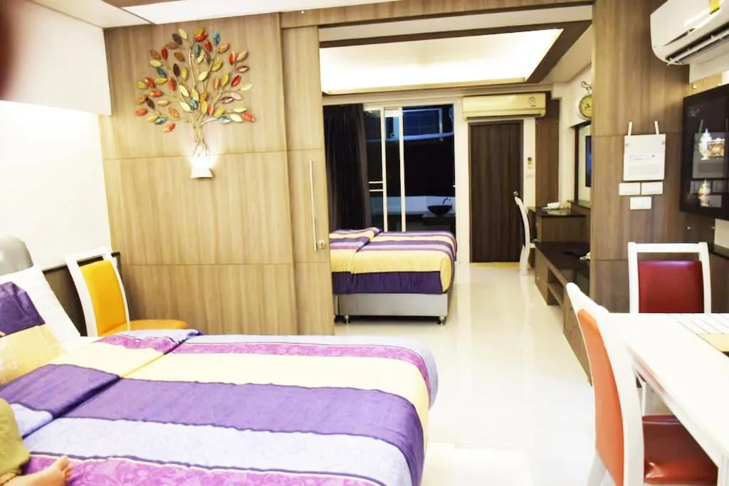 Property building, Bed in Family Suite Room Pratunam