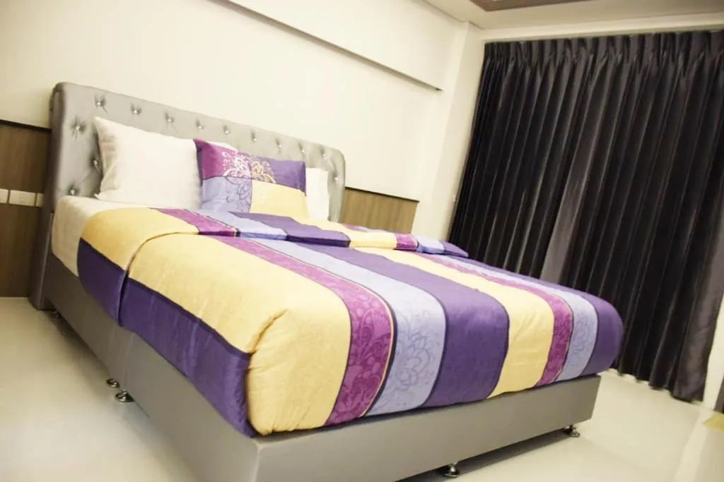 Property building, Bed in Family Suite Room Pratunam