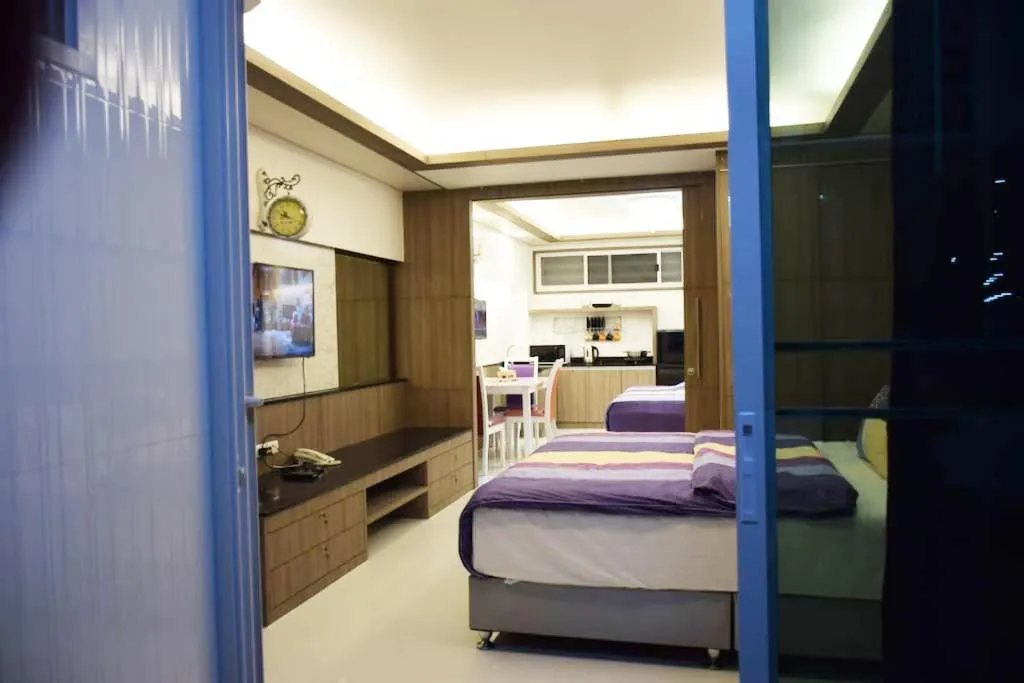 Property building, Bed in Family Suite Room Pratunam