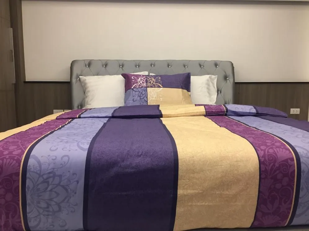 Bed in Family Suite Room Pratunam