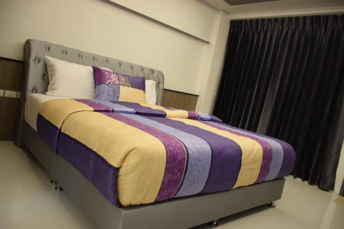 Bed in Family Suite Room Pratunam