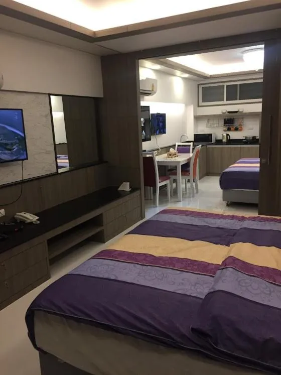 Bed in Family Suite Room Pratunam