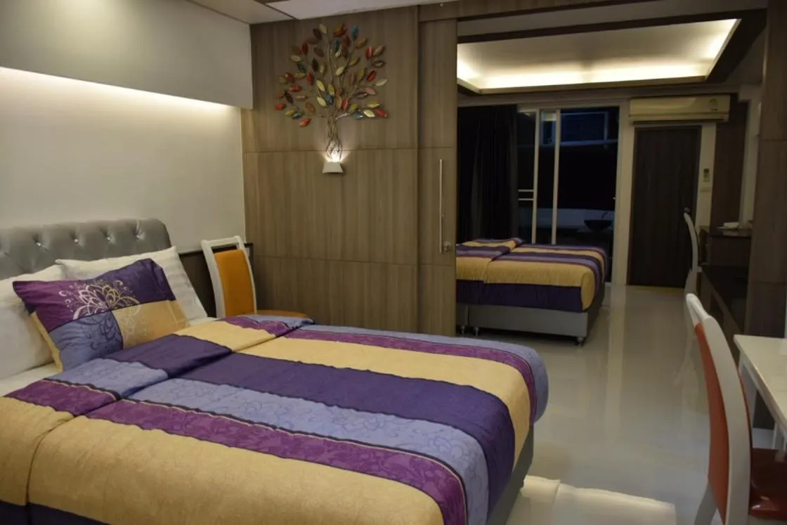 Bed in Family Suite Room Pratunam