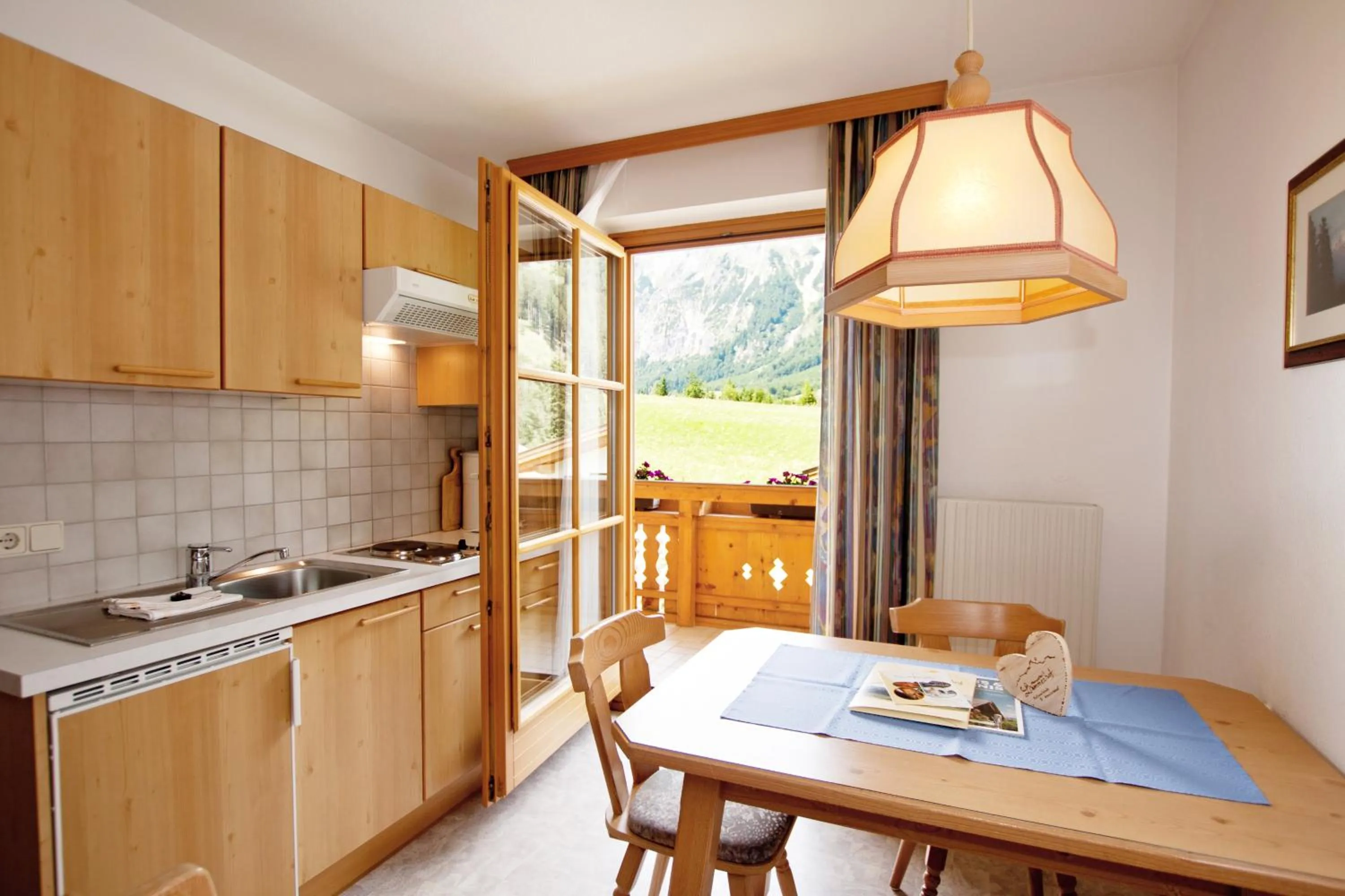 Kitchen or kitchenette in Berghotel Lämmerhof