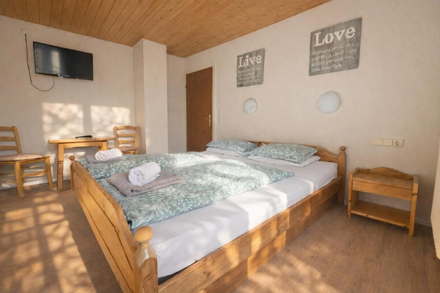 Photo of the whole room, Bed in Pension Bergseeblick